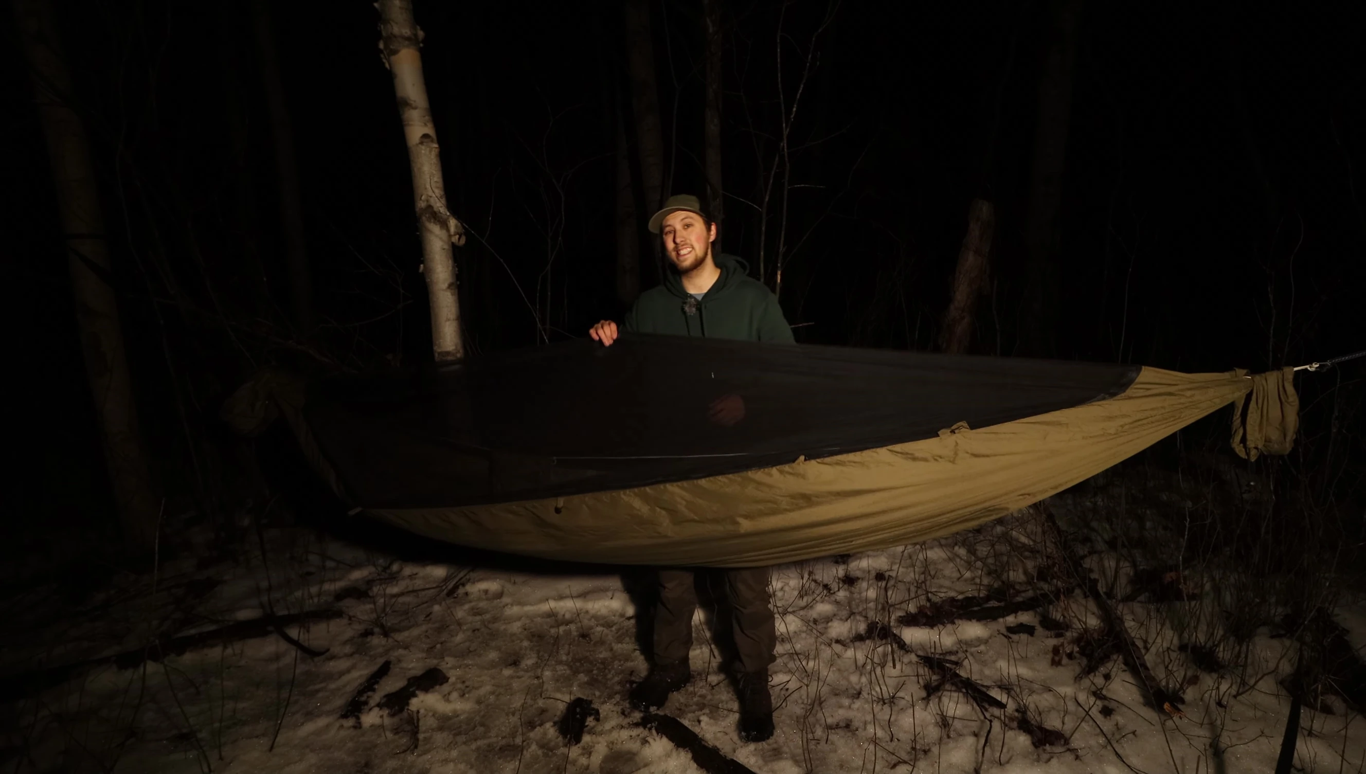 Demonstrating how quickly and easily the winter top cover and the mosquito netting can be removed and installed.