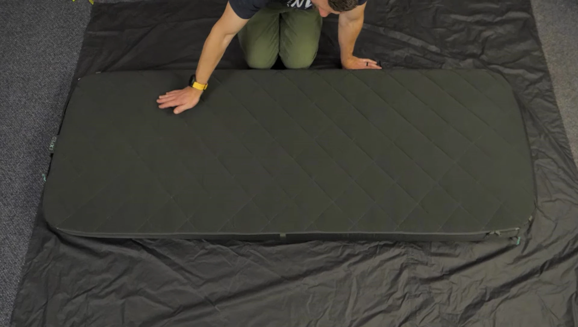 Person demonstrating the size of the pad