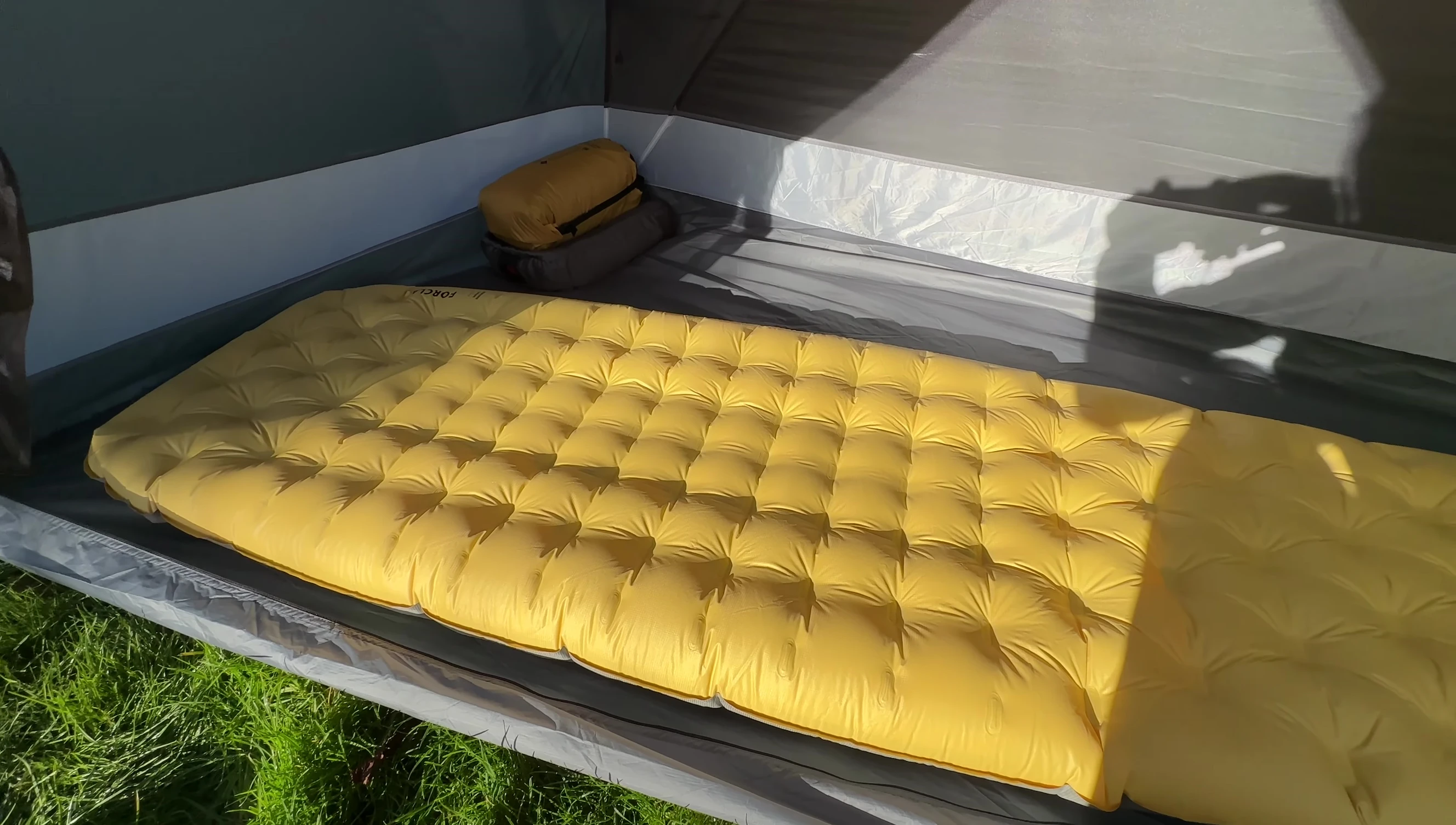 The fully inflated sleeping pad, demonstrating its shape.