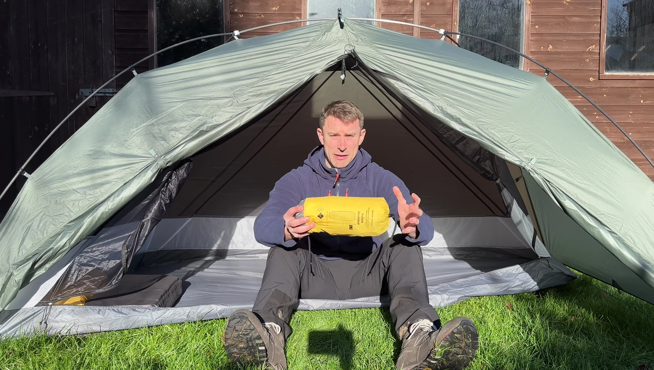 Close-up of the packed sleeping pad, showcasing its compact size.