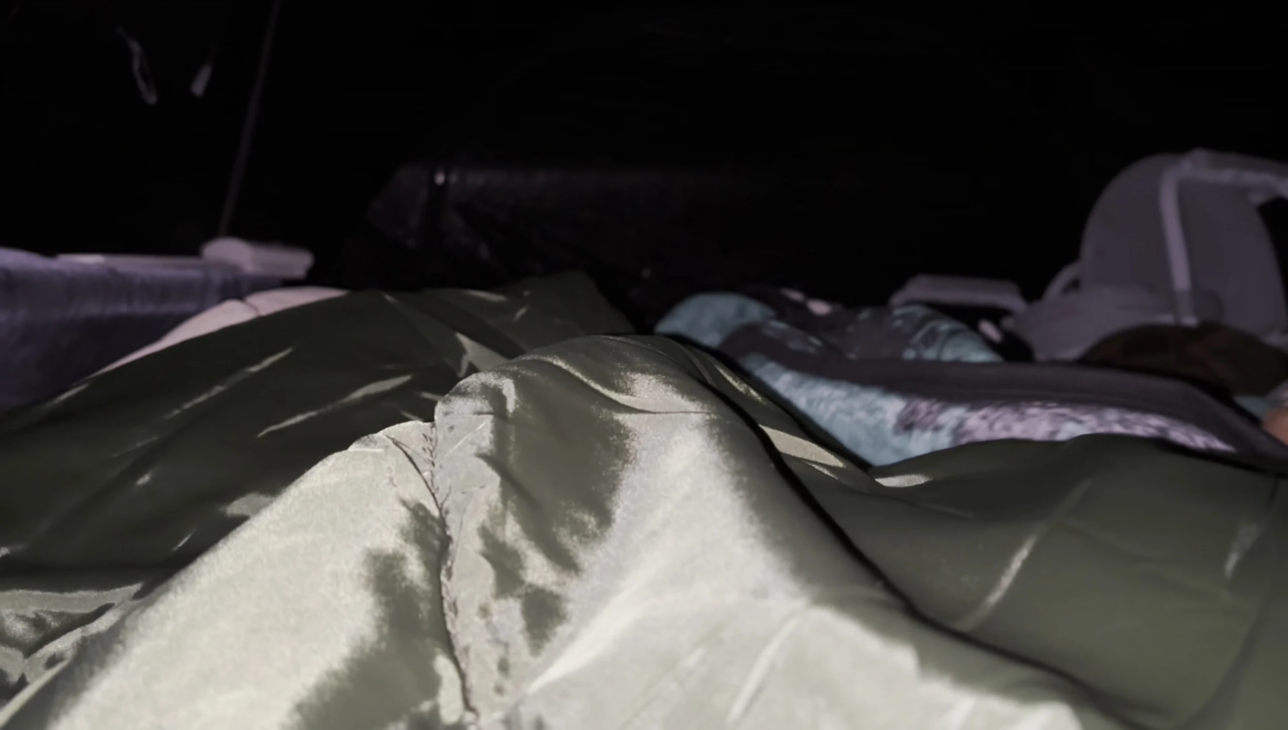 The reviewer shows the sleeping bag after a night of use.