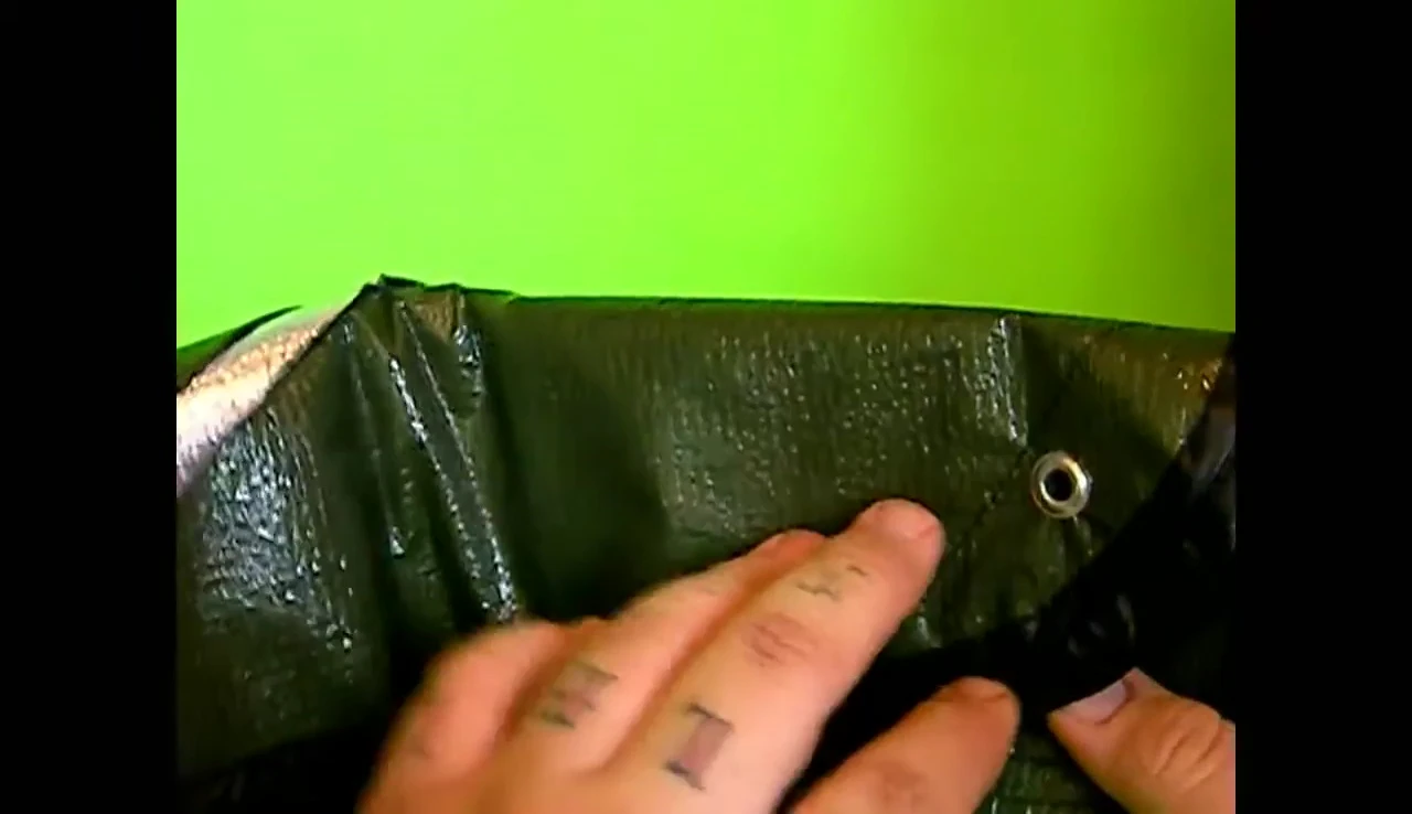 Close-up showcasing the reinforced corners and grommets.