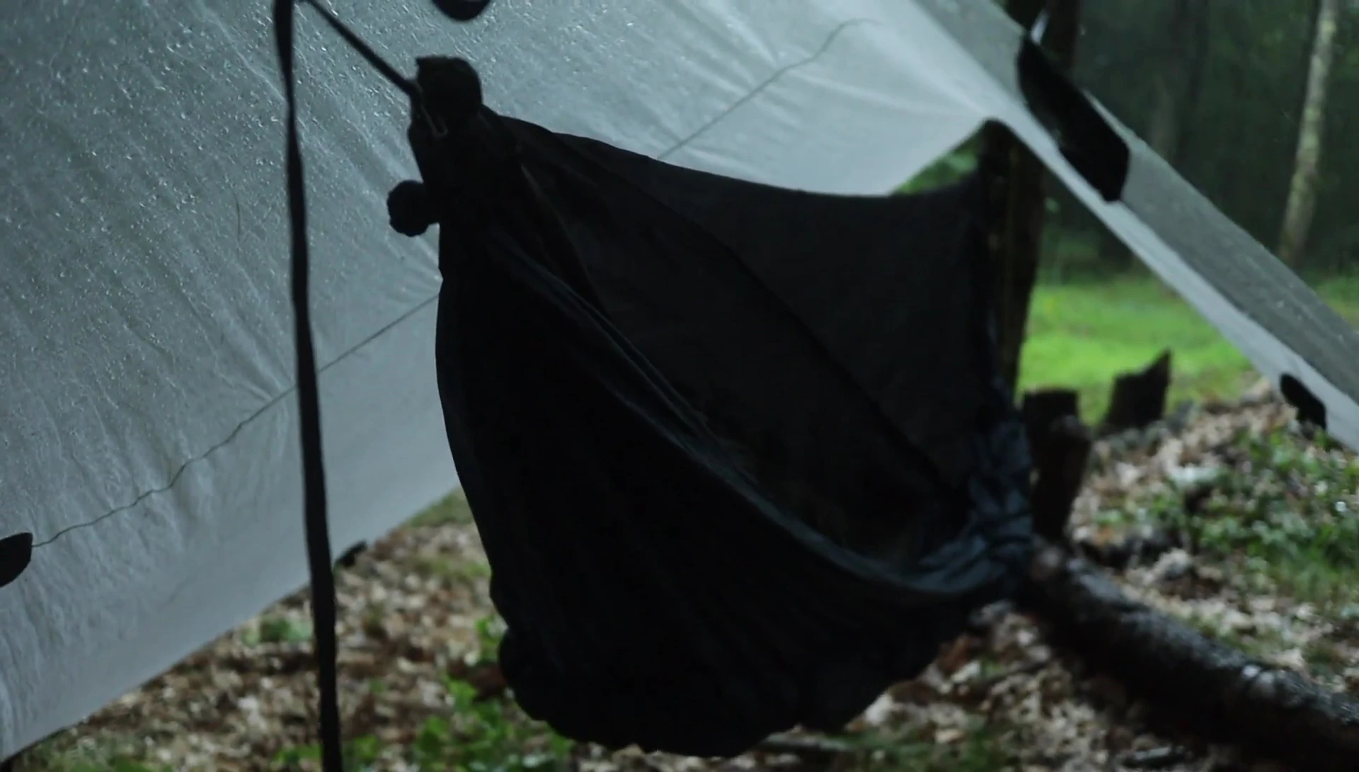 The hammock remains dry despite the rain.