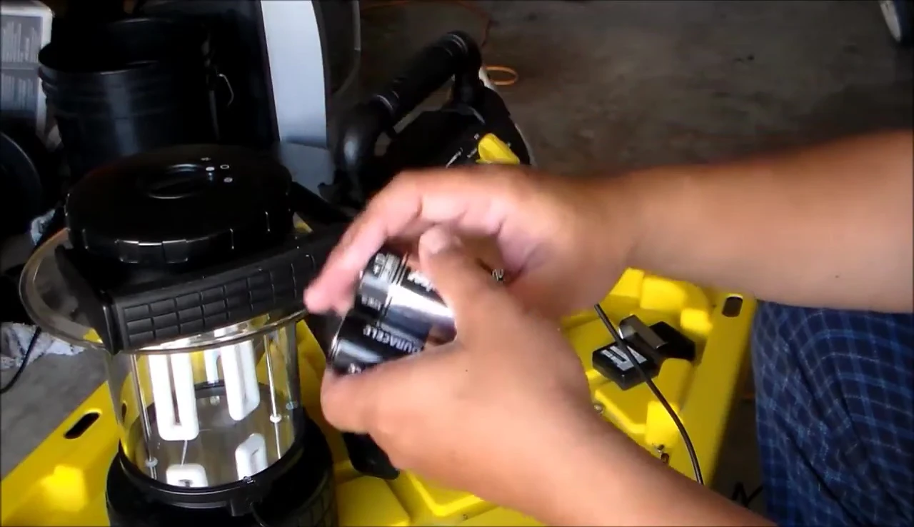 The jump starter being used with the lantern