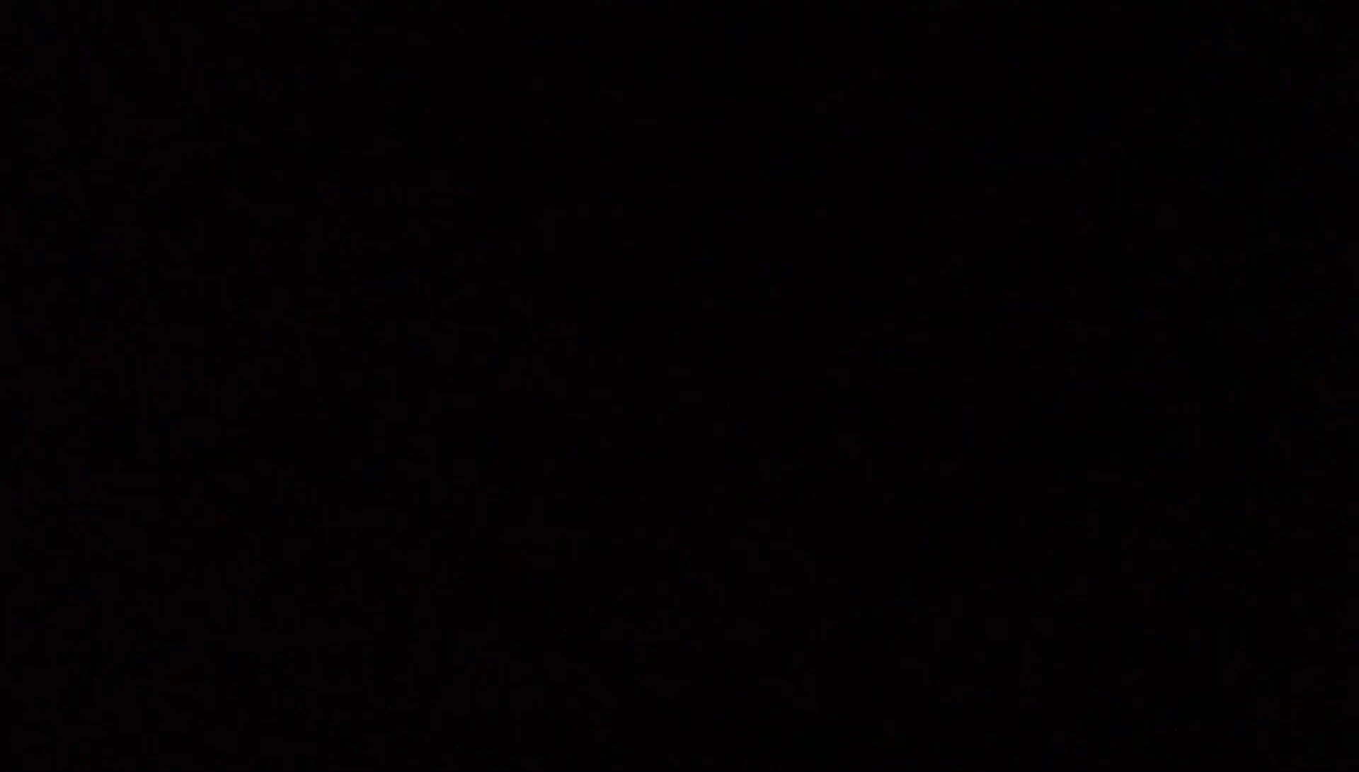 The lantern illuminating a car engine bay.