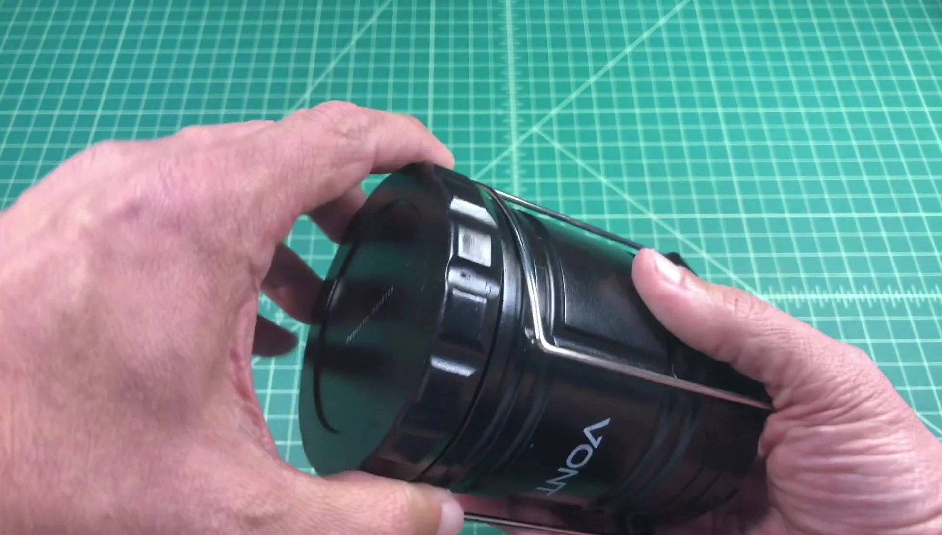 The bottom of the lantern showing the battery compartment.
