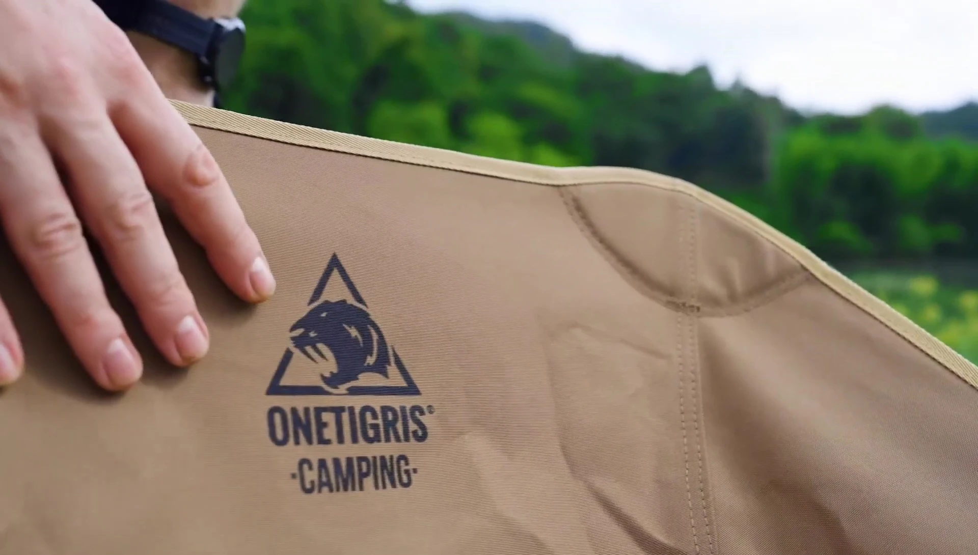 Close-up of the folded OneTigris Tiger Blade chair, highlighting its compact size.