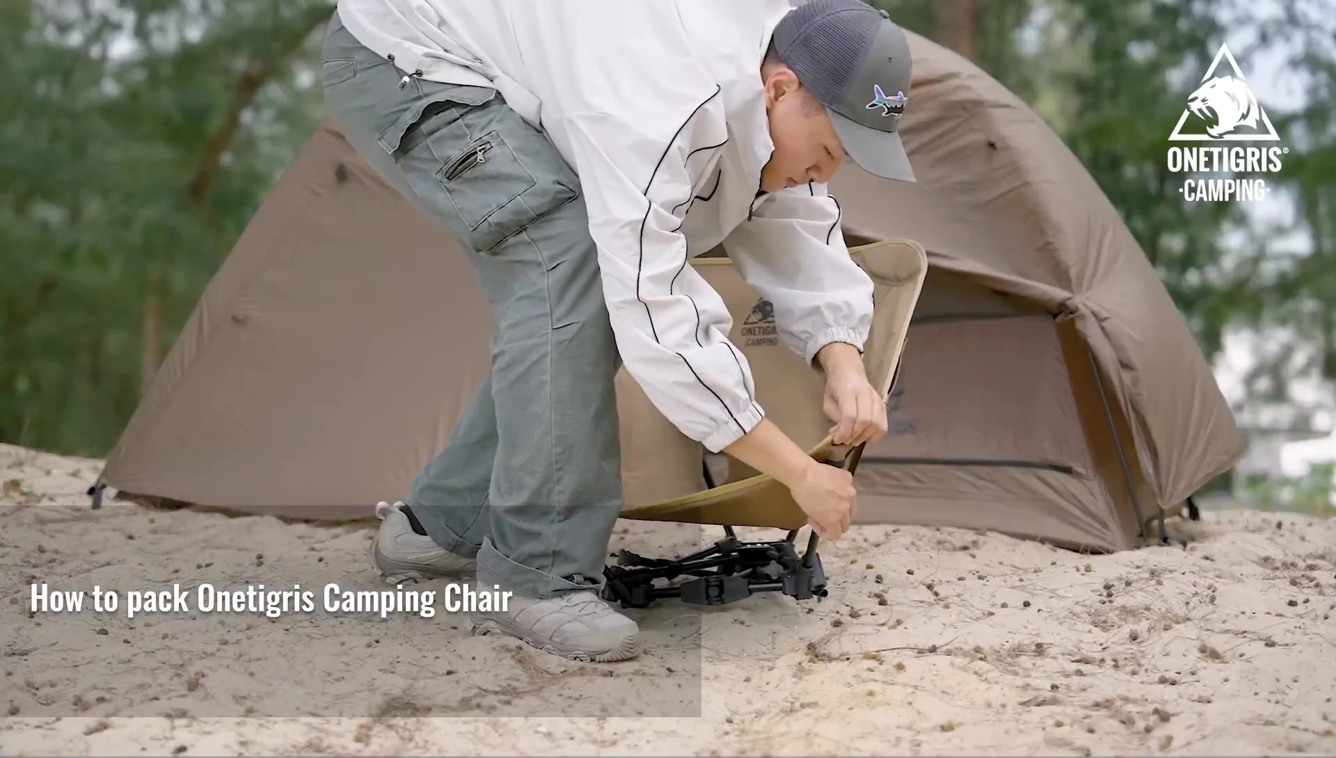 A person sitting comfortably in the OneTigris Tiger Blade chair.