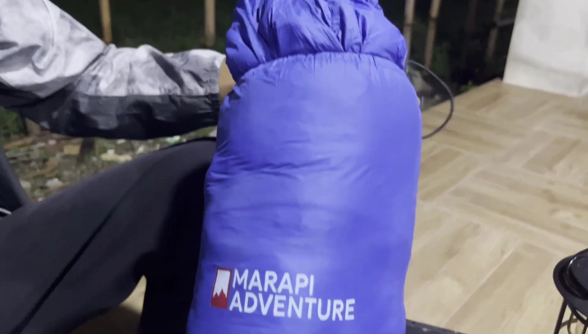 Person holding and showing the lightweight thermal bag