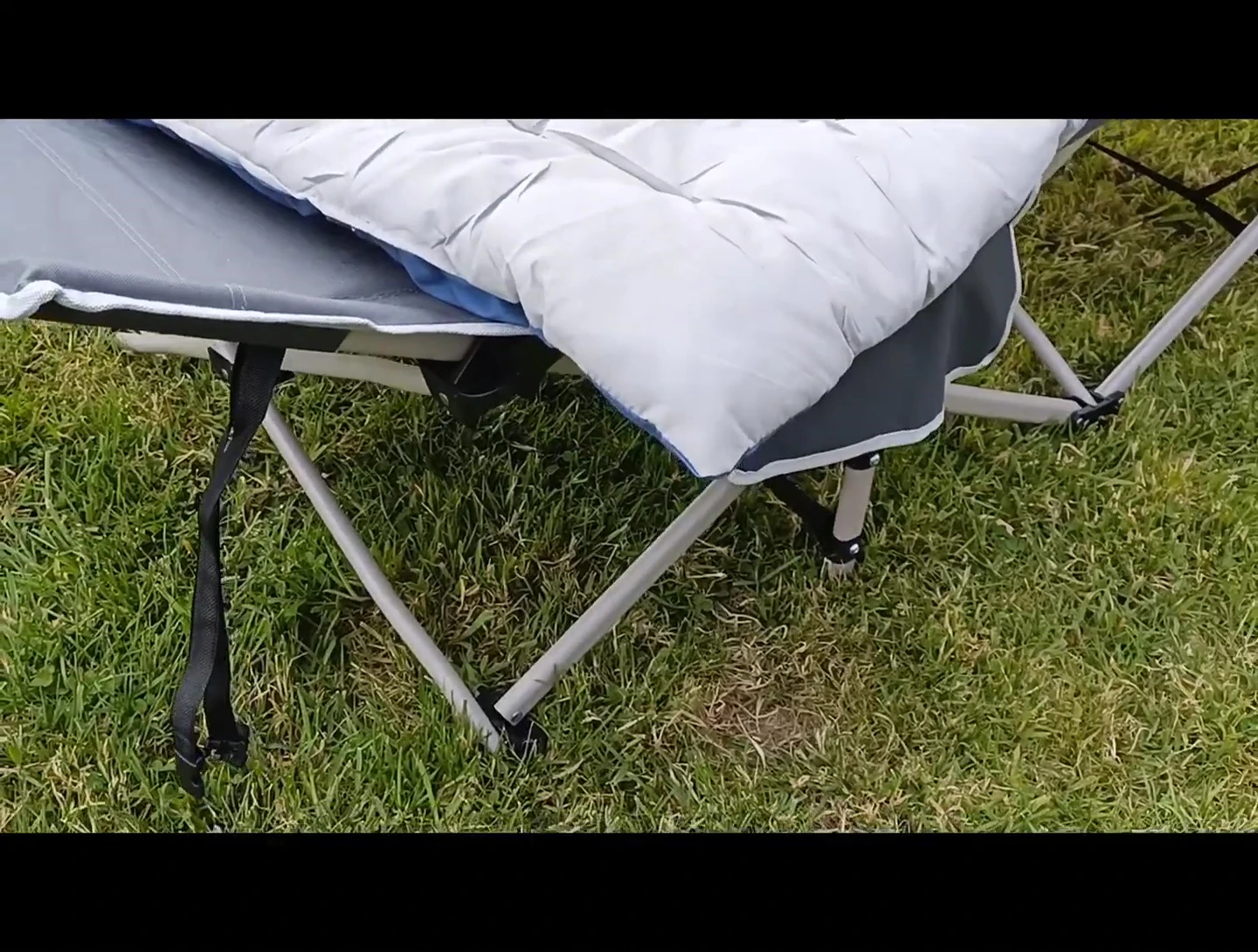 Securing the top padding straps.