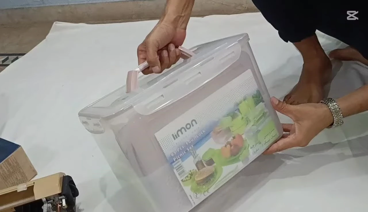 The 85-piece picnic set in its packaging, highlighting the quantity of items.