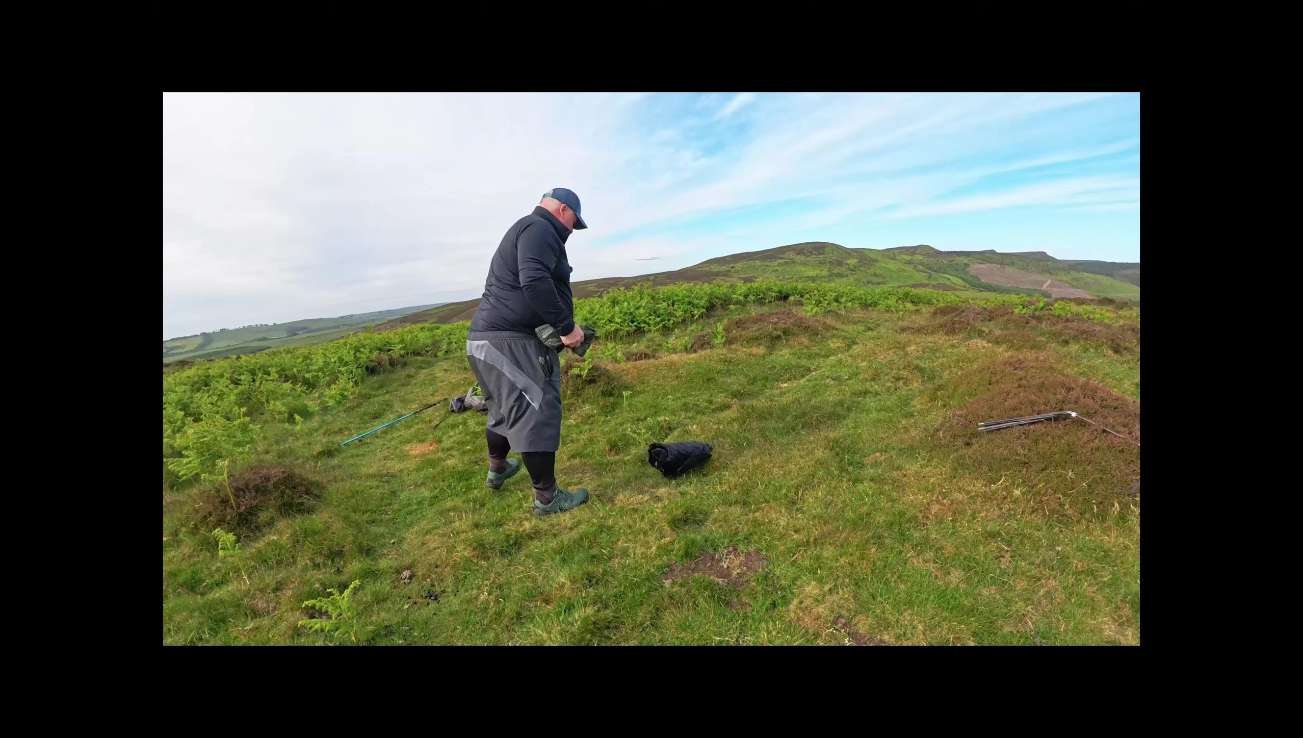 Shot highlighting the ease of storing the tent poles in a backpack.