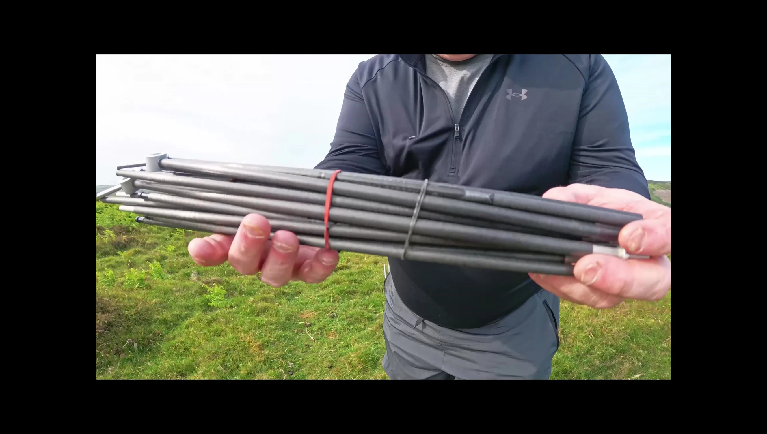 Close-up of the unused carbon fiber poles, showcasing their quality and condition.