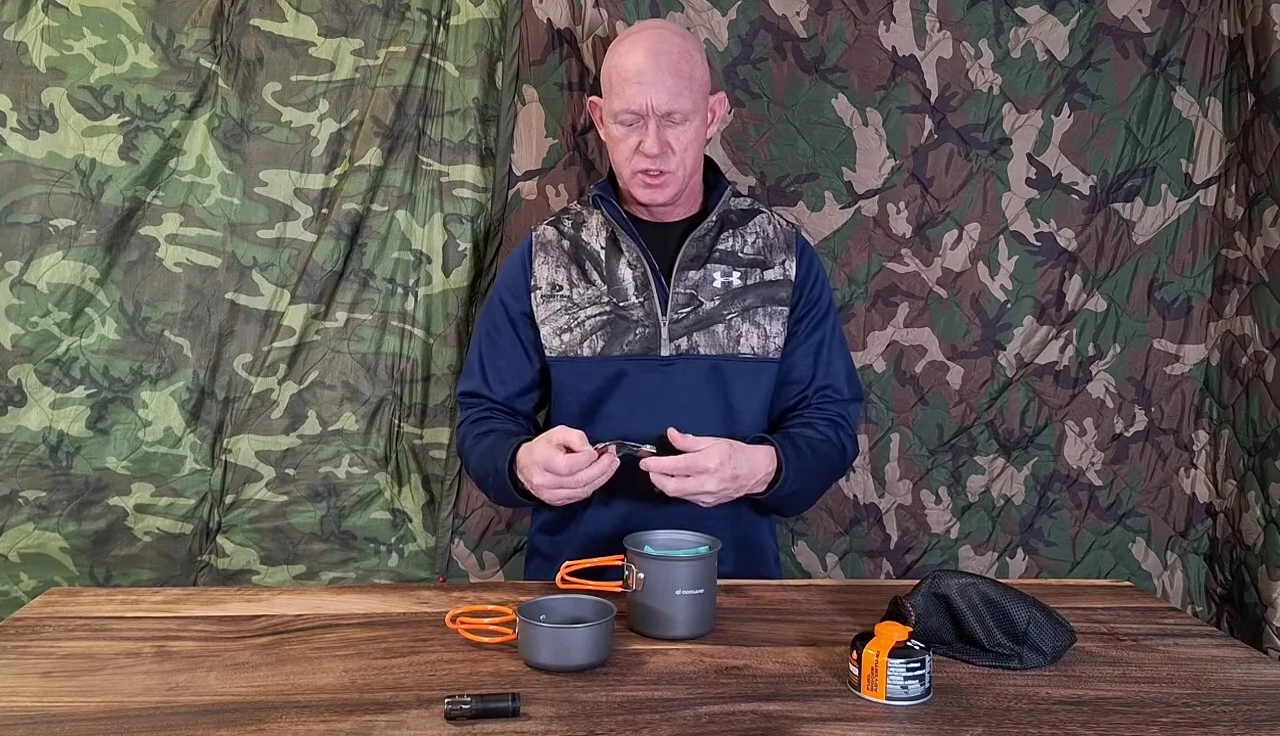 The foldable spork included with the mess kit.