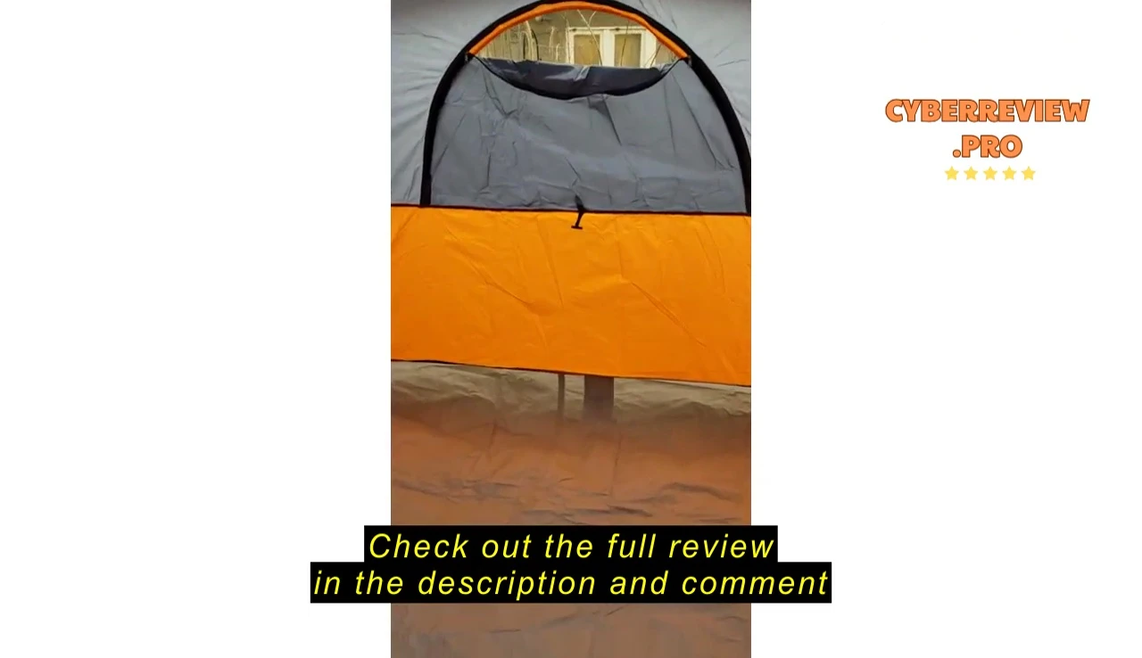 The reviewer standing inside the tent
