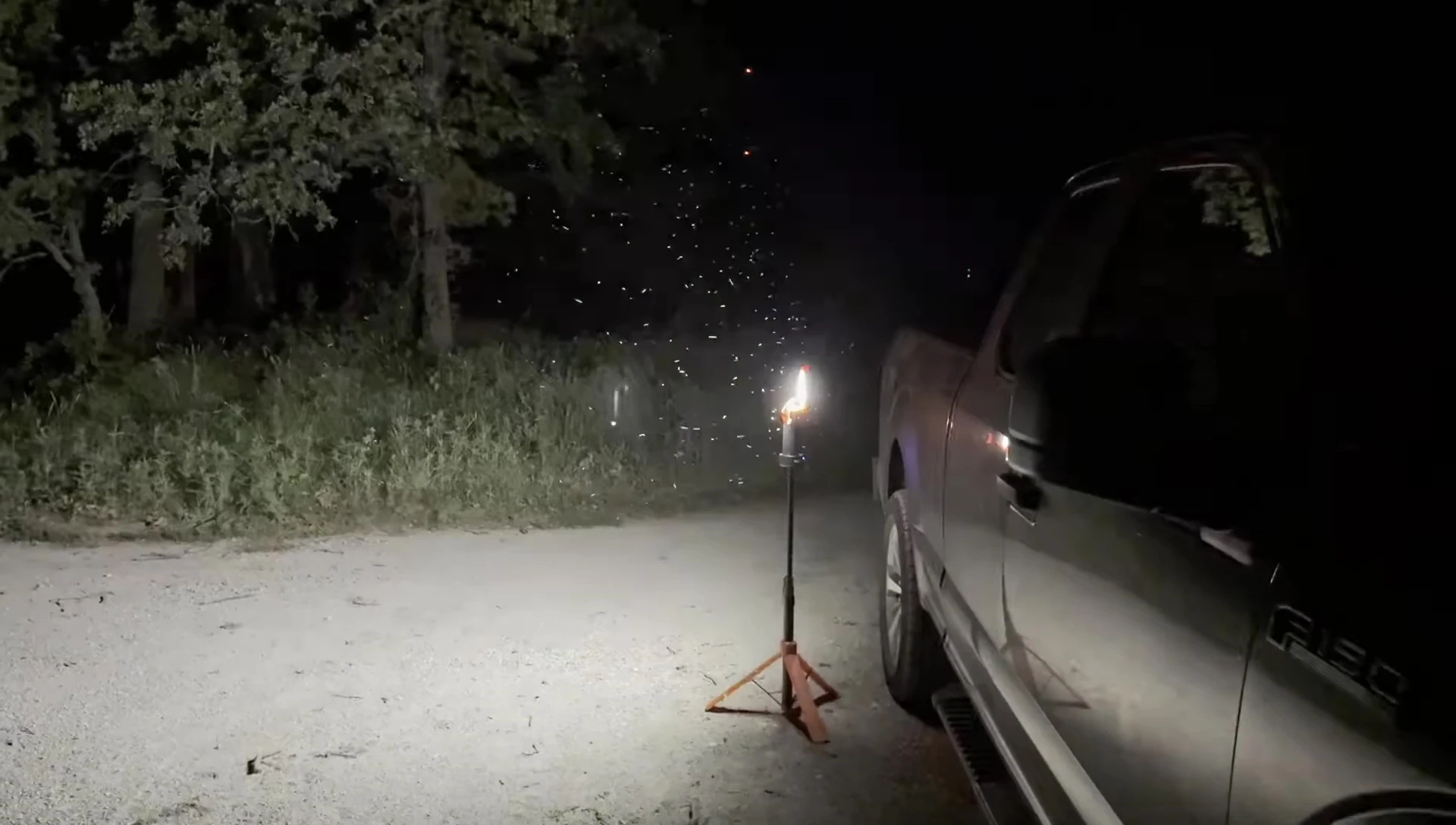 The lantern illuminating a playground area at night