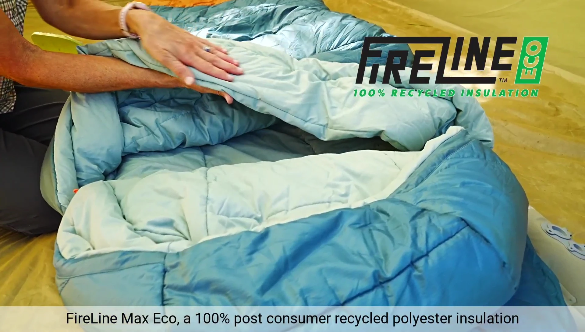 Close-up view of the sleeping bag's outer fabric and its features