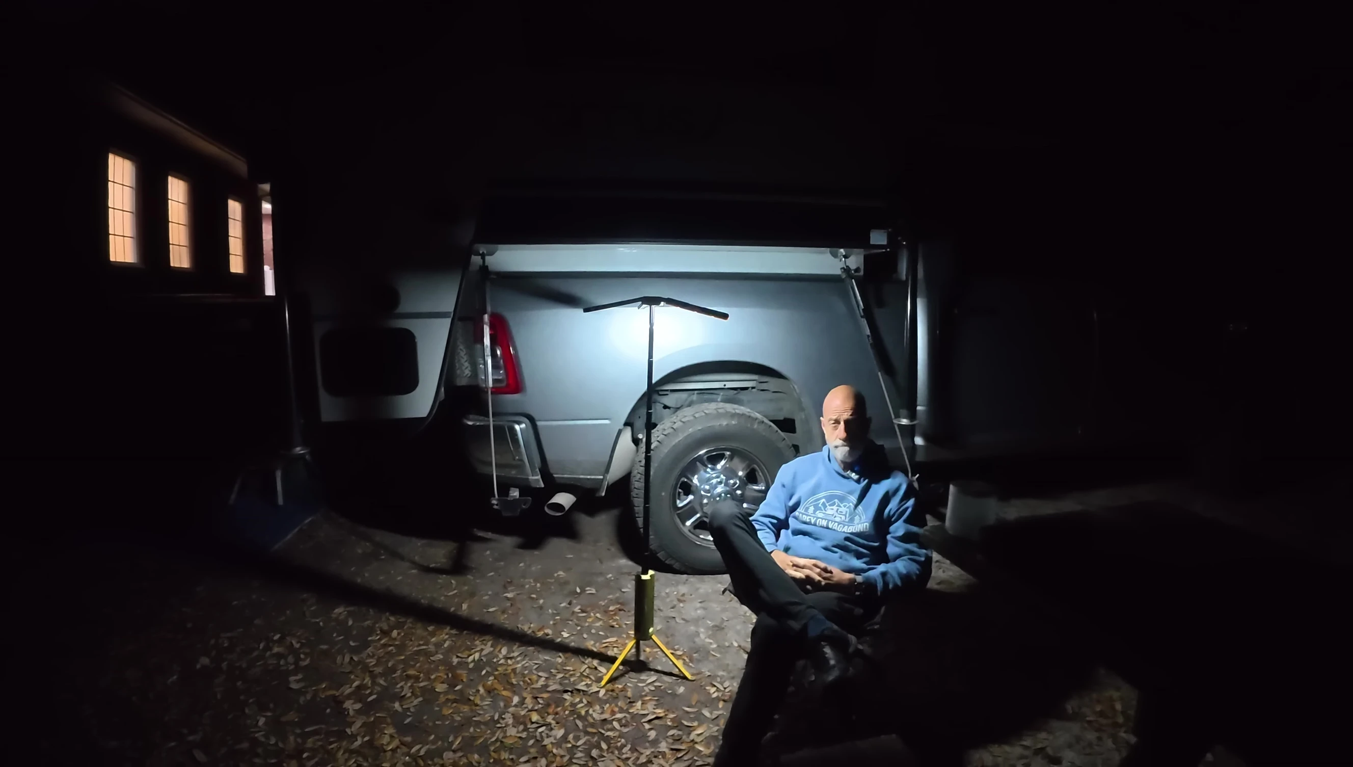 The lantern illuminating the campsite at night.