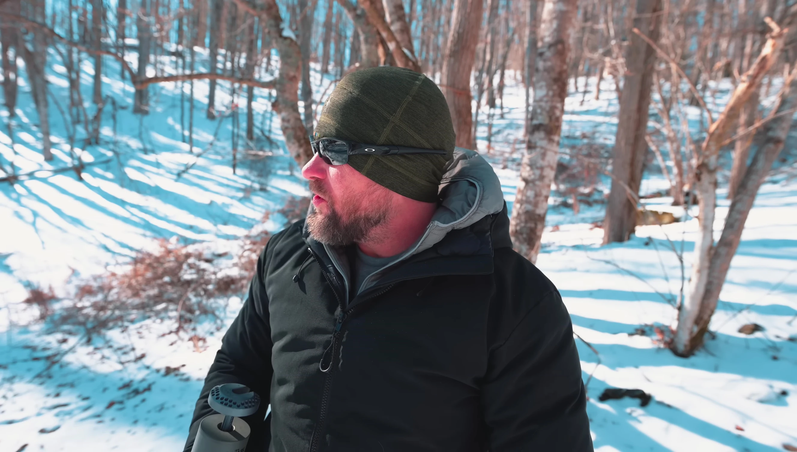 The reviewer demonstrating the lantern's use in cold weather conditions.