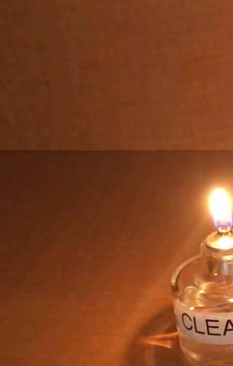 Incorrect wick adjustment demonstration (too high)