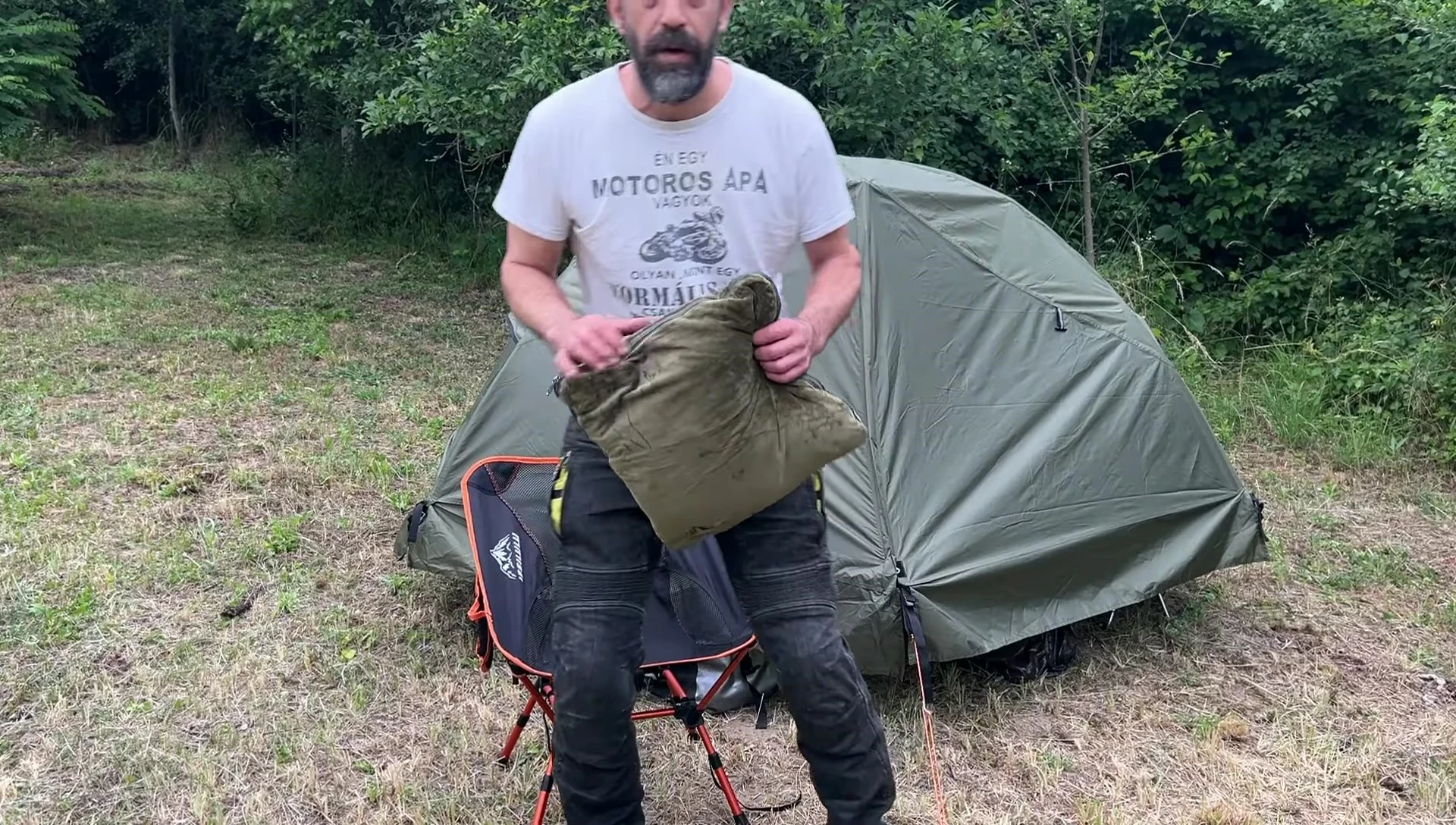 A shot showing the speaker summarizing his experience with the tent