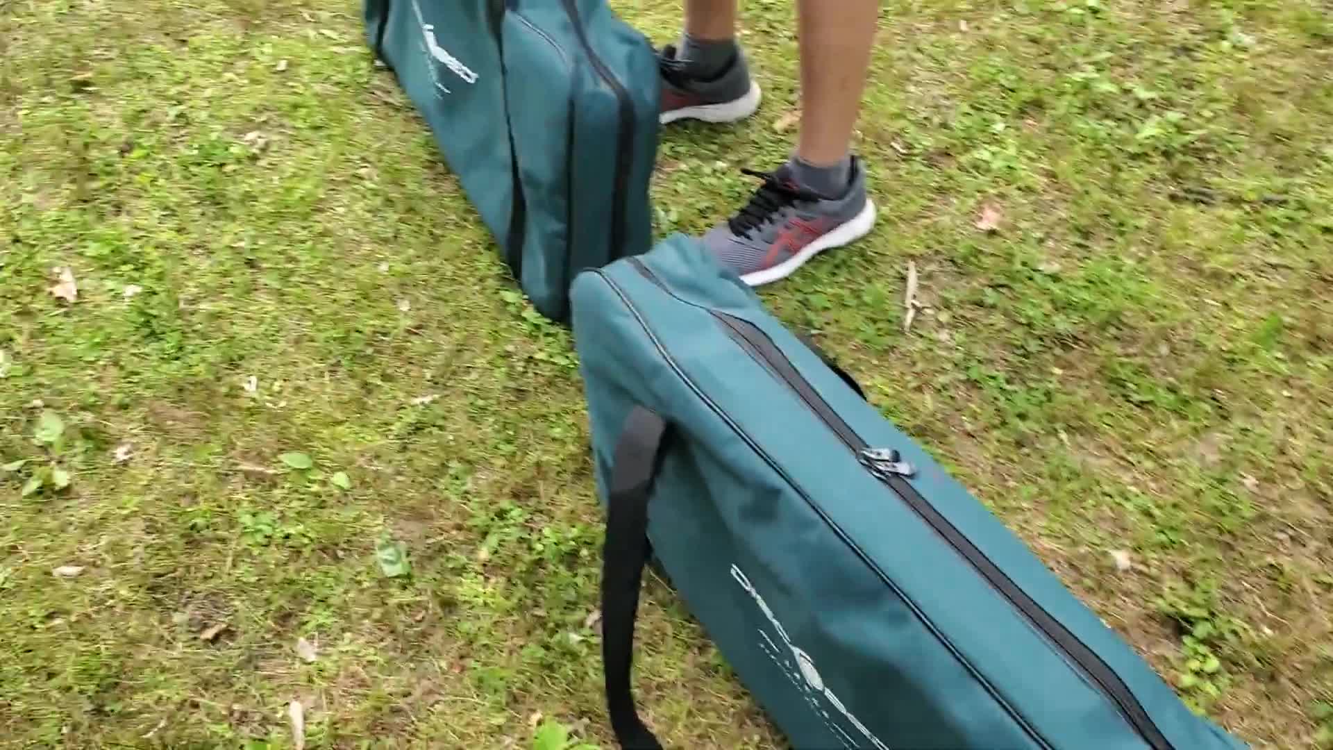 Close-up of the carrying bags containing Disc-O-Bed components.