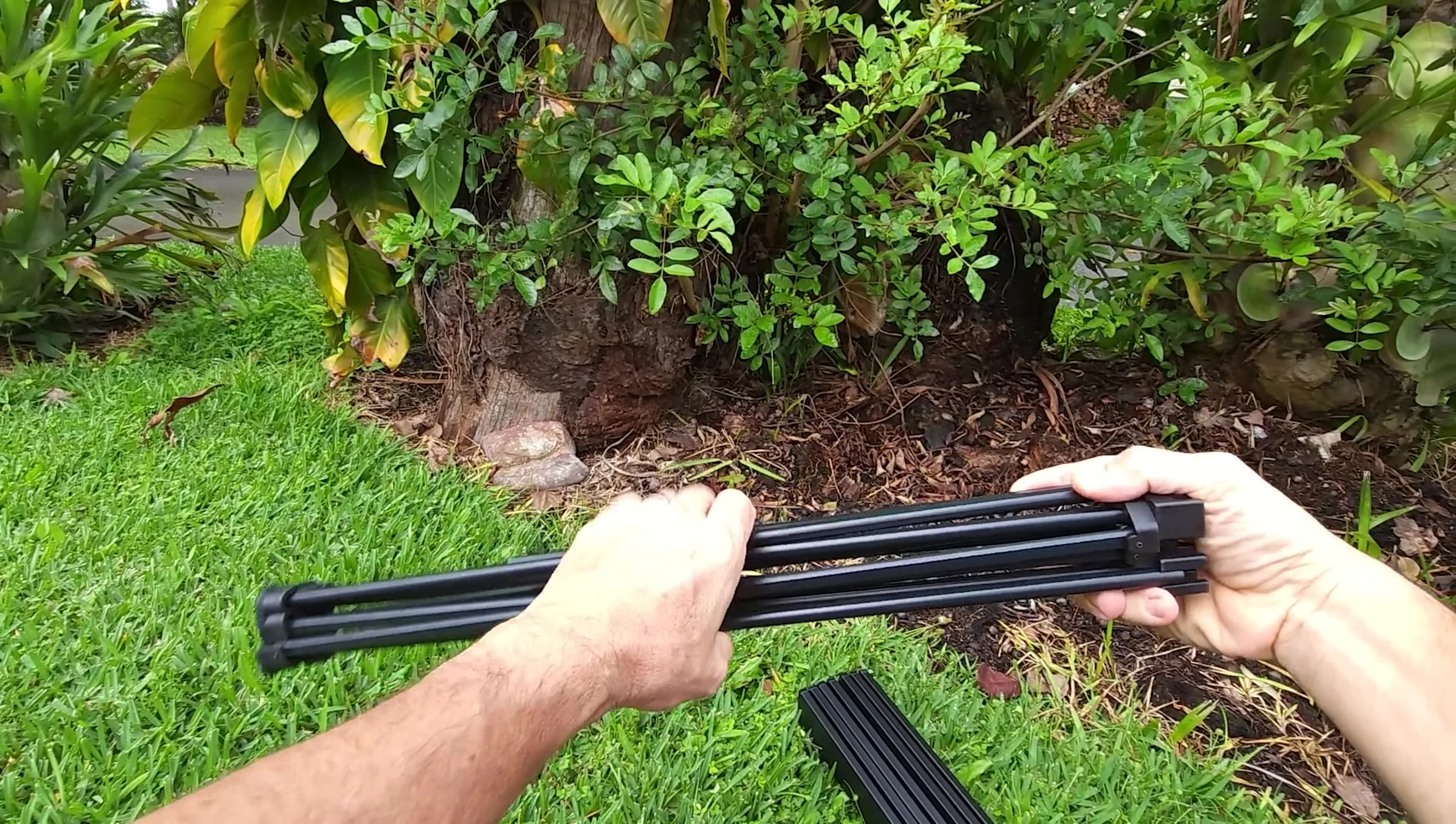 Person demonstrating the easy assembly of the table legs