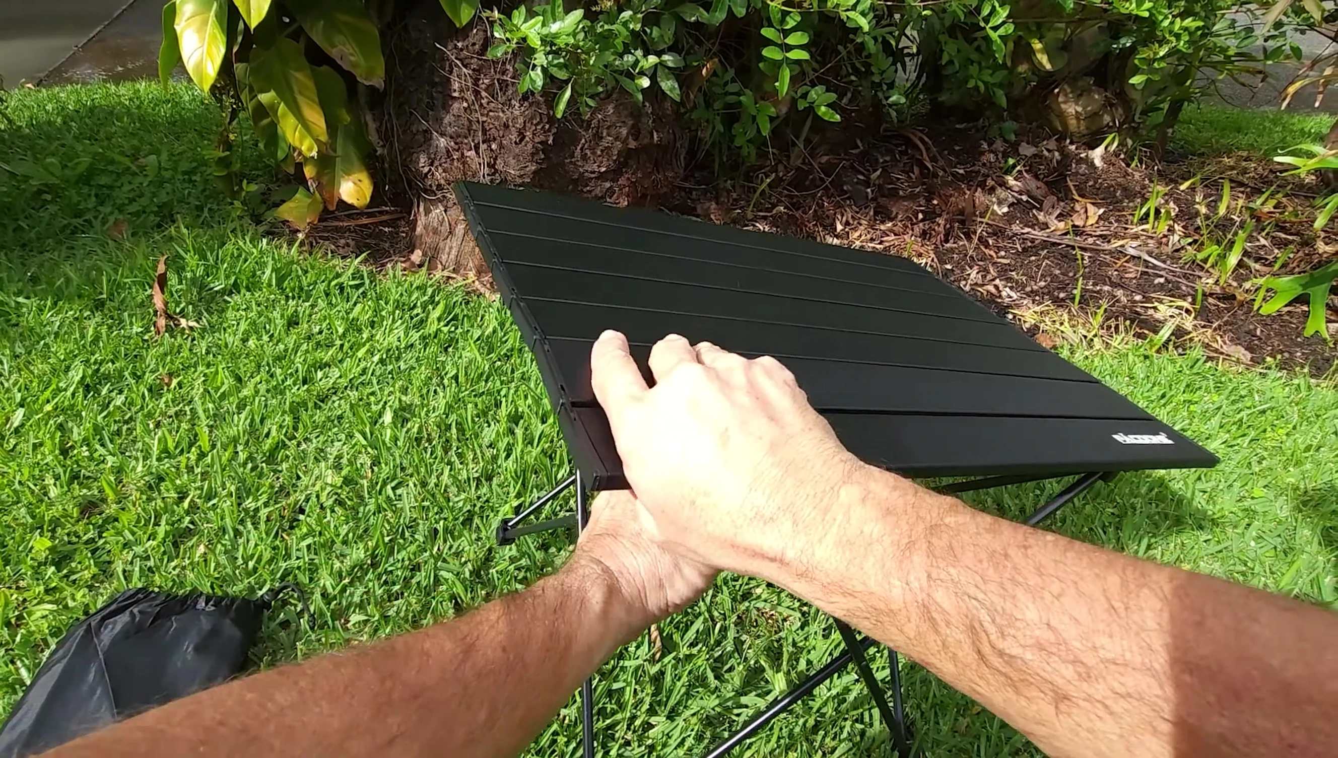 Person detaching the table top