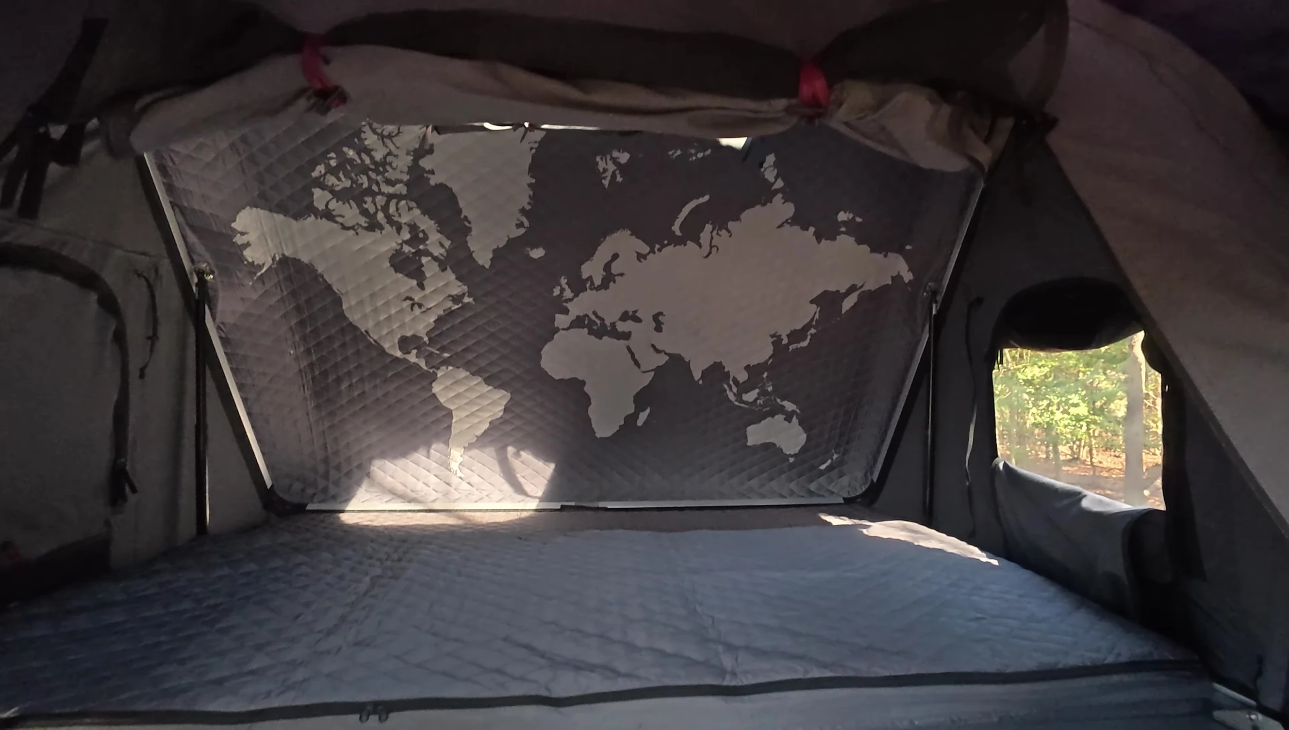 The speaker stepping inside the tent