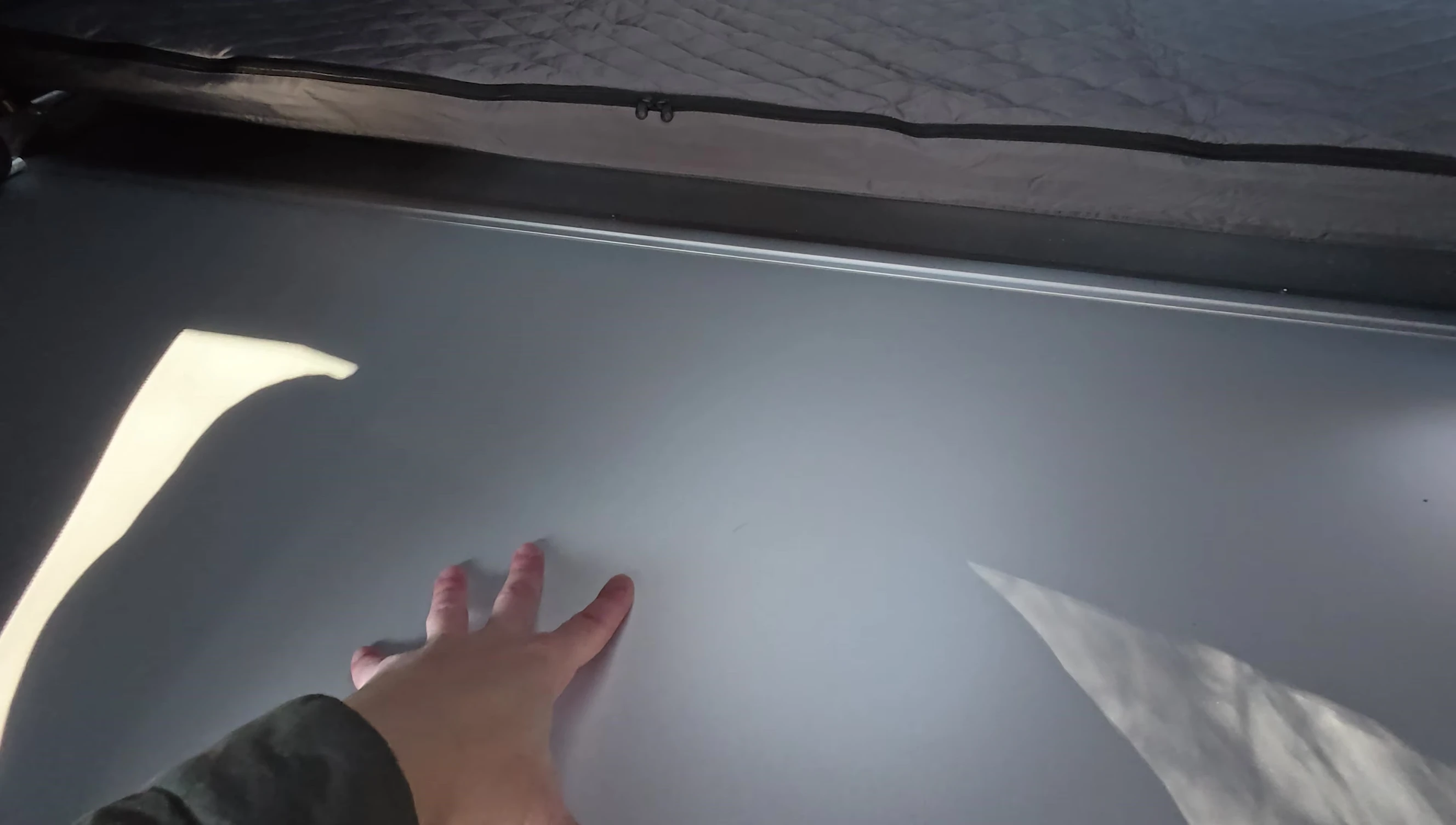 Interior of the tent showing the expandable floor and mattress.