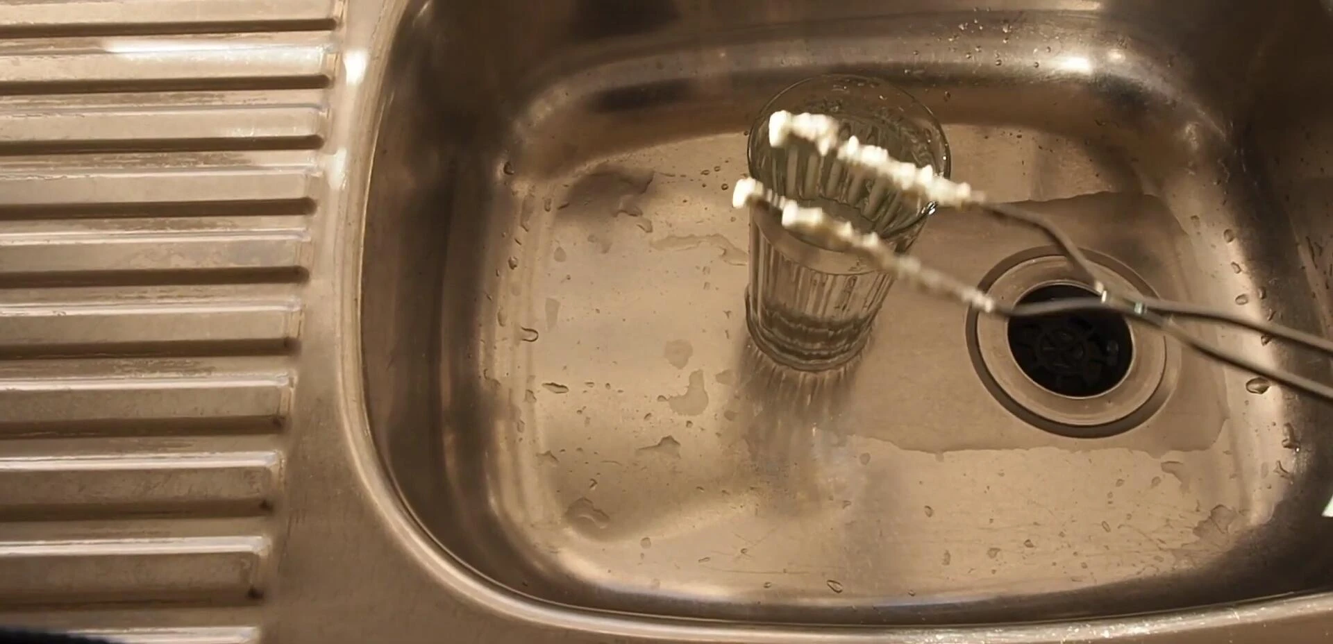 The cooking forks being cleaned.