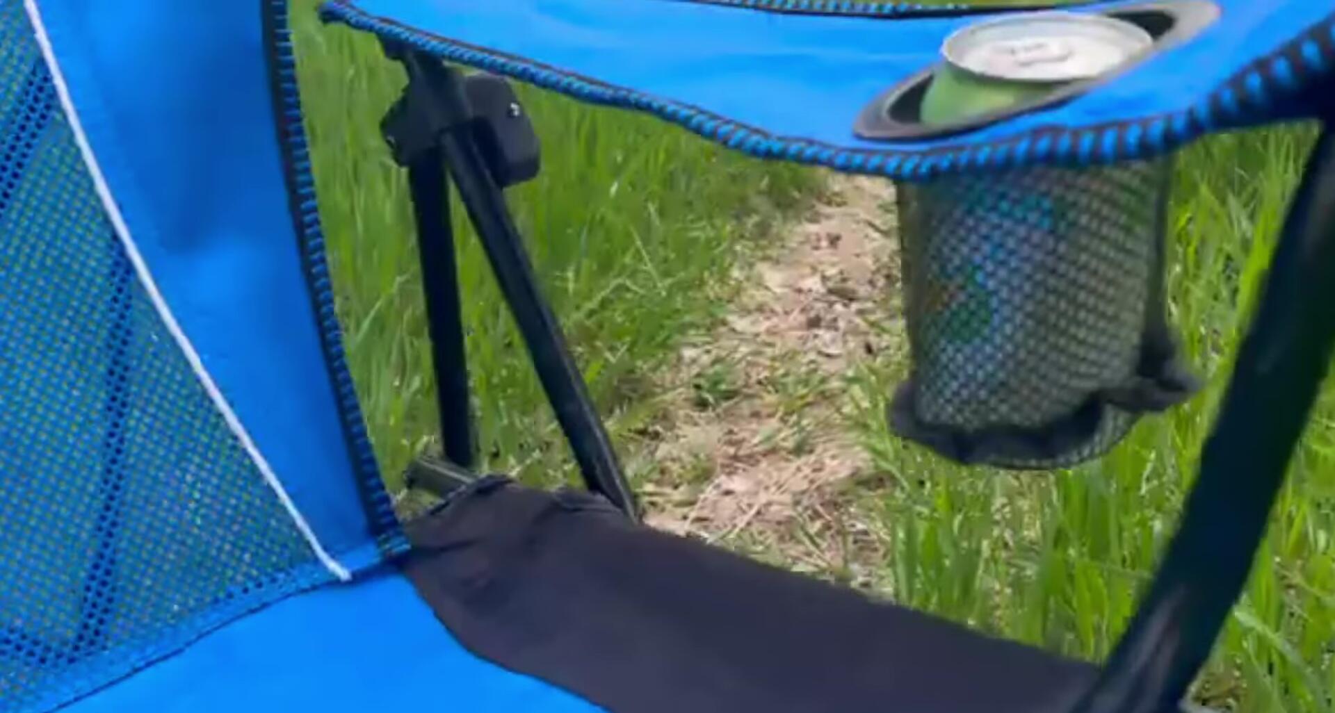 The armrest cup holder and storage pockets.