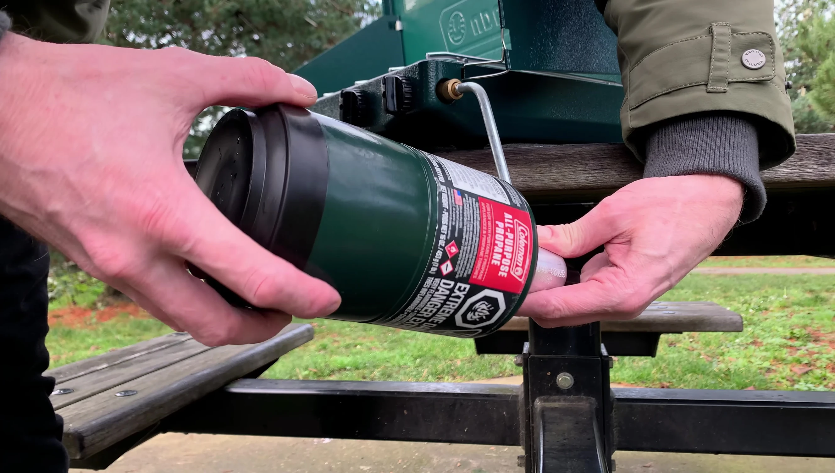 Shot showing the compact size and dimensions of the folded camping stove.