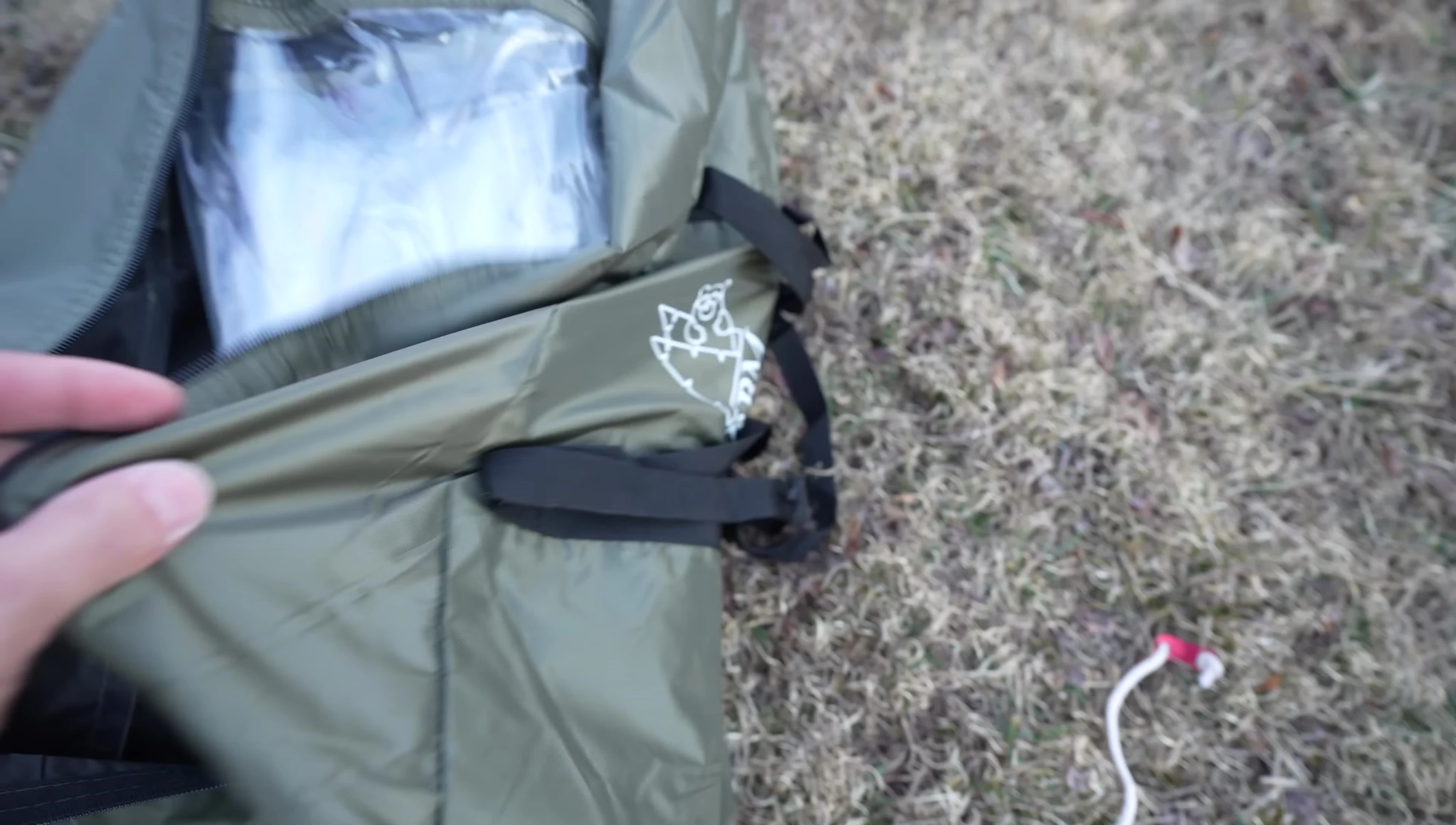 The storage bag for the rain fly and vinyl windows.
