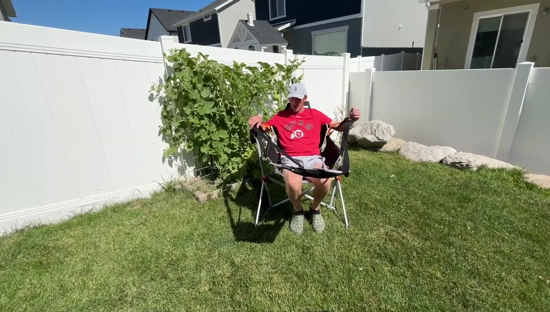 Person sitting in the chair demonstrating its sturdiness