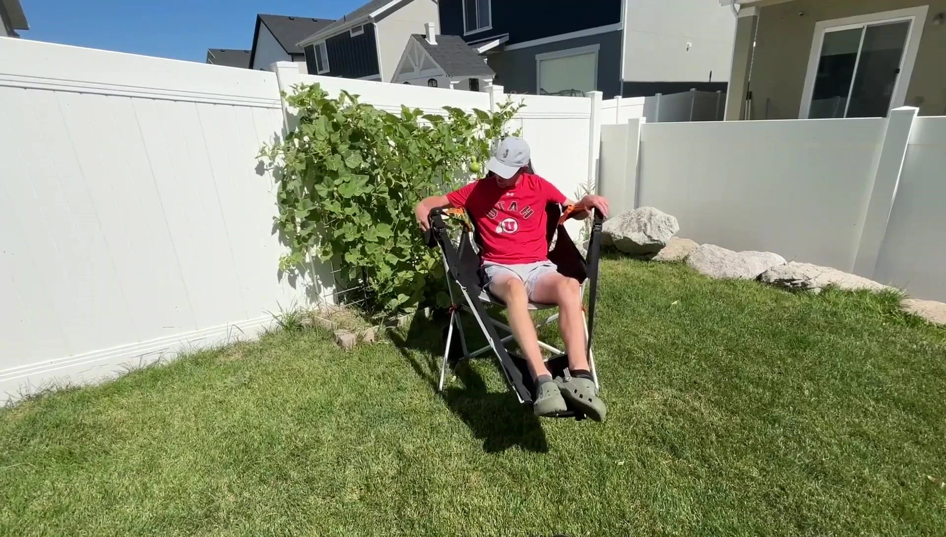 Person demonstrating the chair's versatility