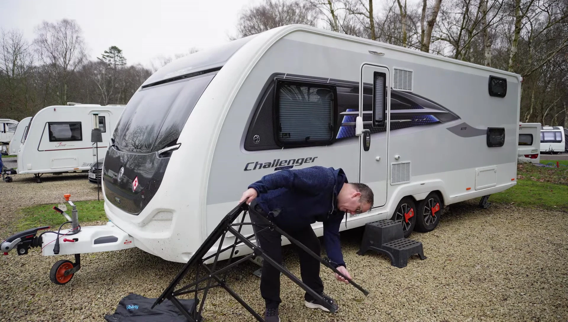 Demonstration of adjusting the legs to a higher setting.