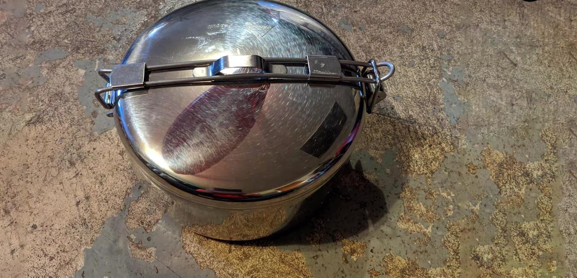 Close up of the cookware pieces, highlighting their nesting capabilities.