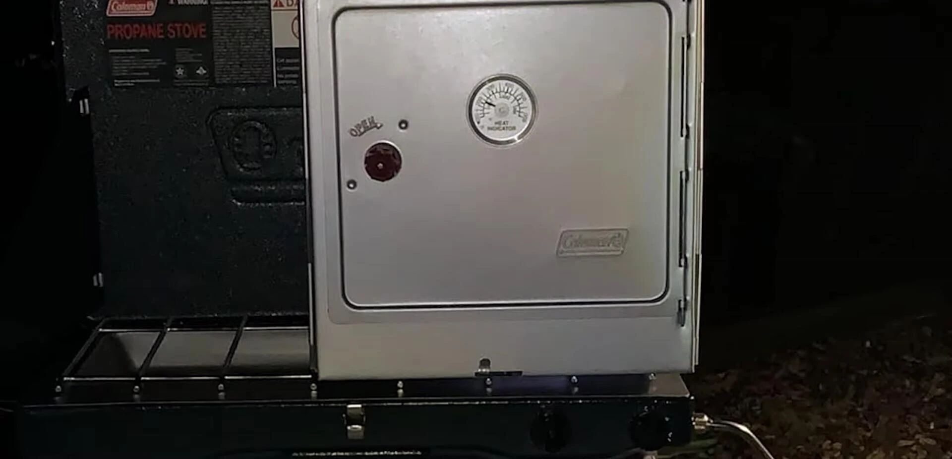 The oven in use, showcasing its two burners.