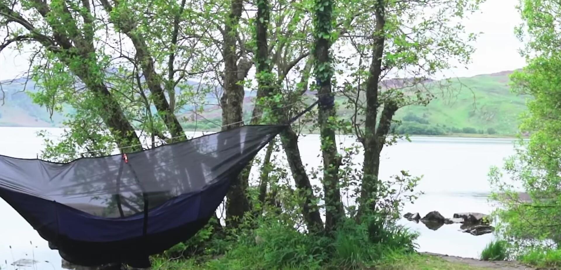 Close-up shot of the Kua Koala Max Hammock's features: pockets and bug mesh