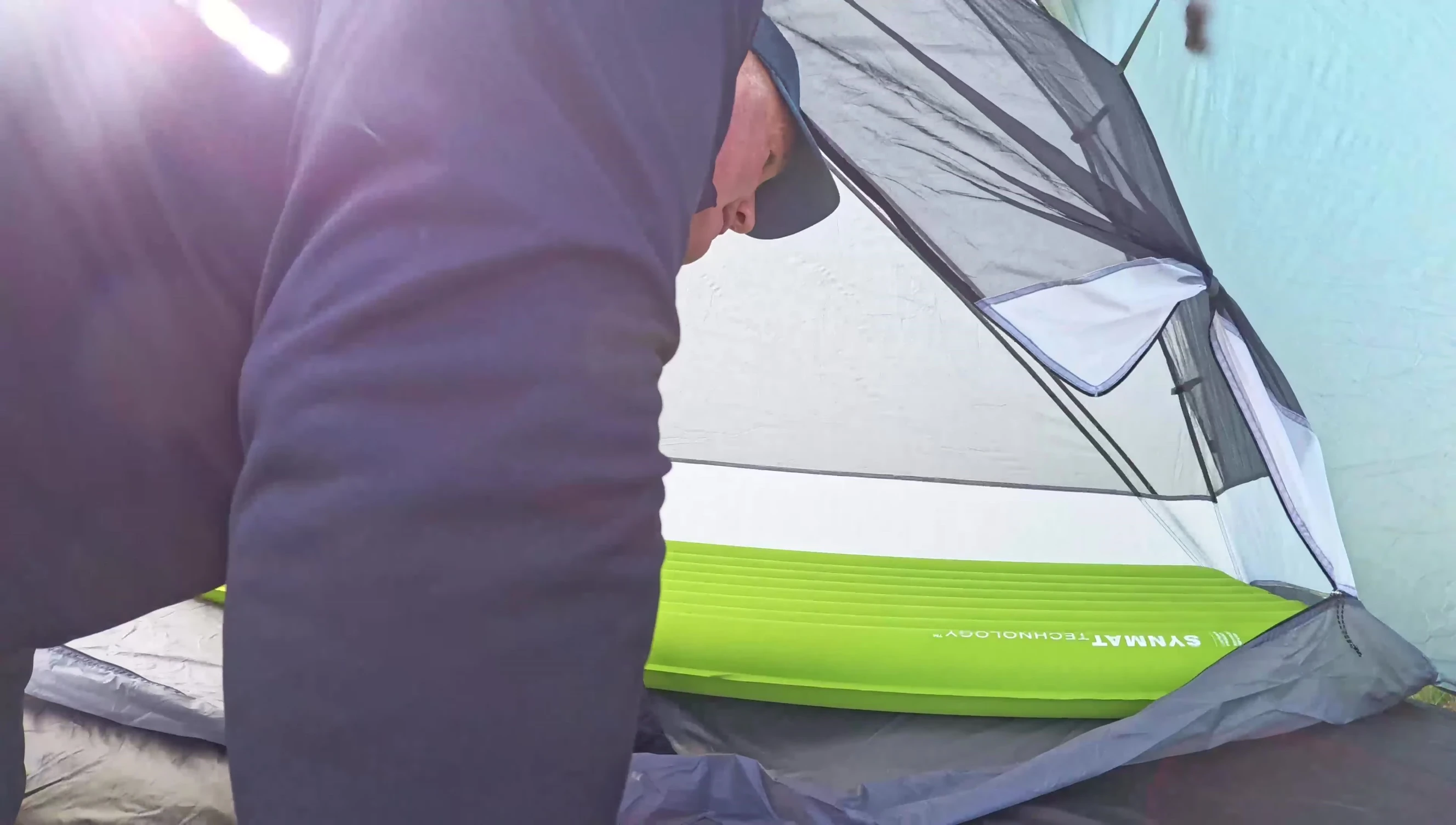 The reviewer comparing the comfort of the Exped pad to another sleeping mat.