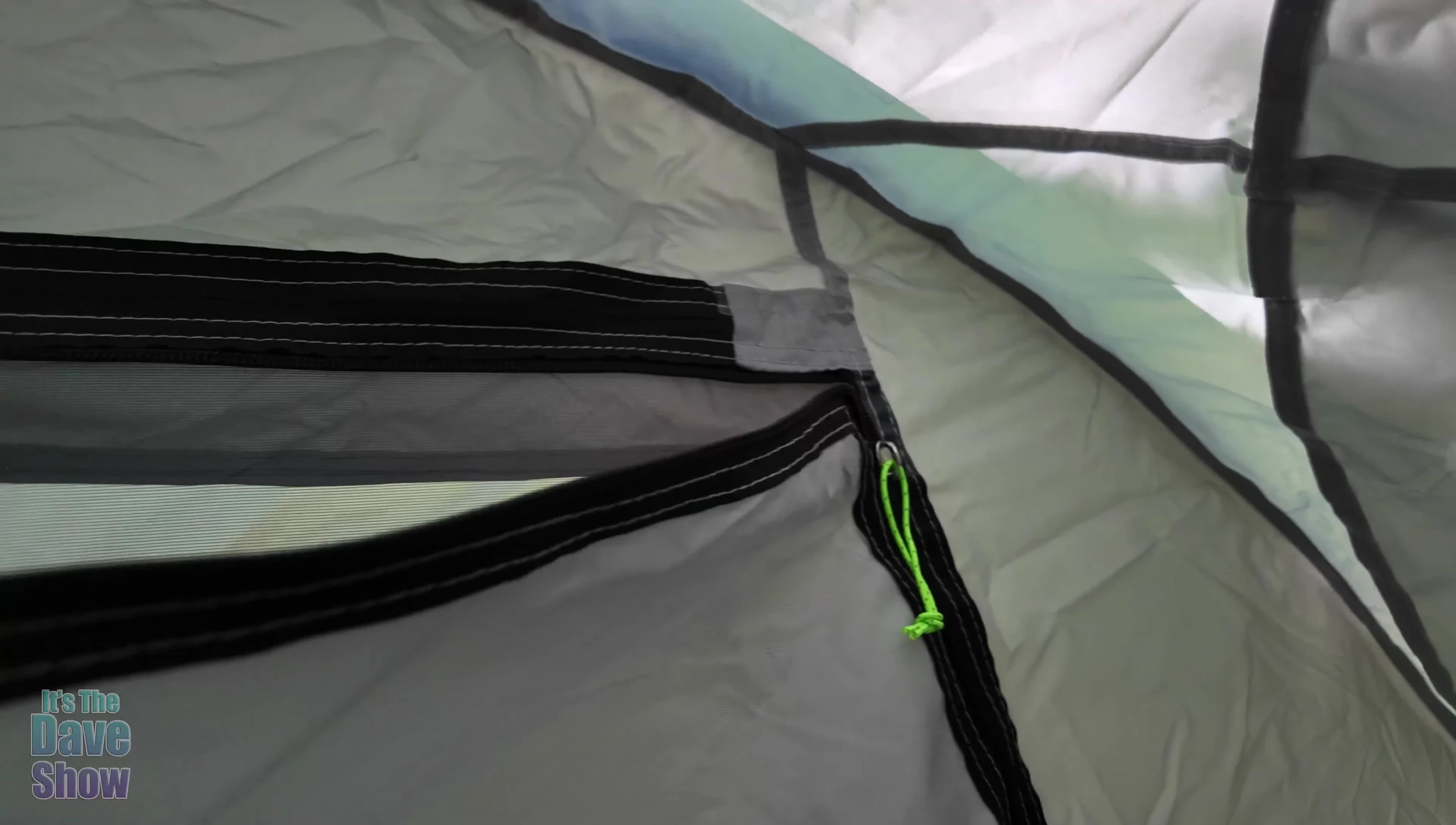 Rainfly being attached to the tent