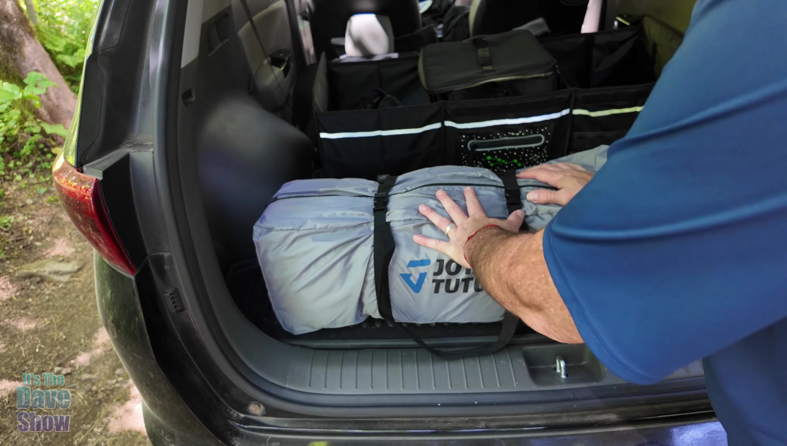 SUV tent in its carrying bag