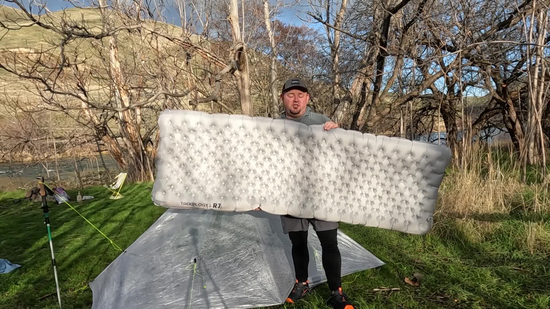 Close-up of the Trekology UL R7 sleeping pad showing its dimensions and thickness.