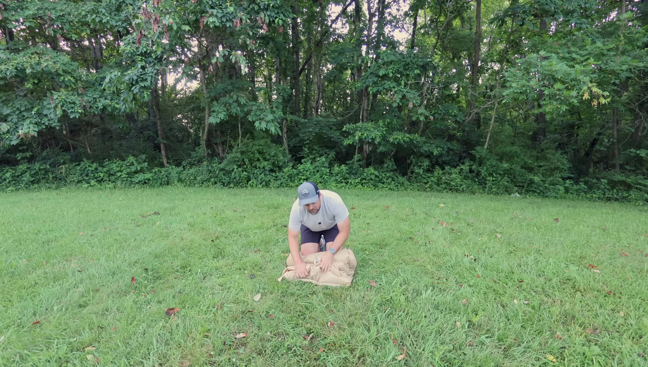 Folding the deflated tent.