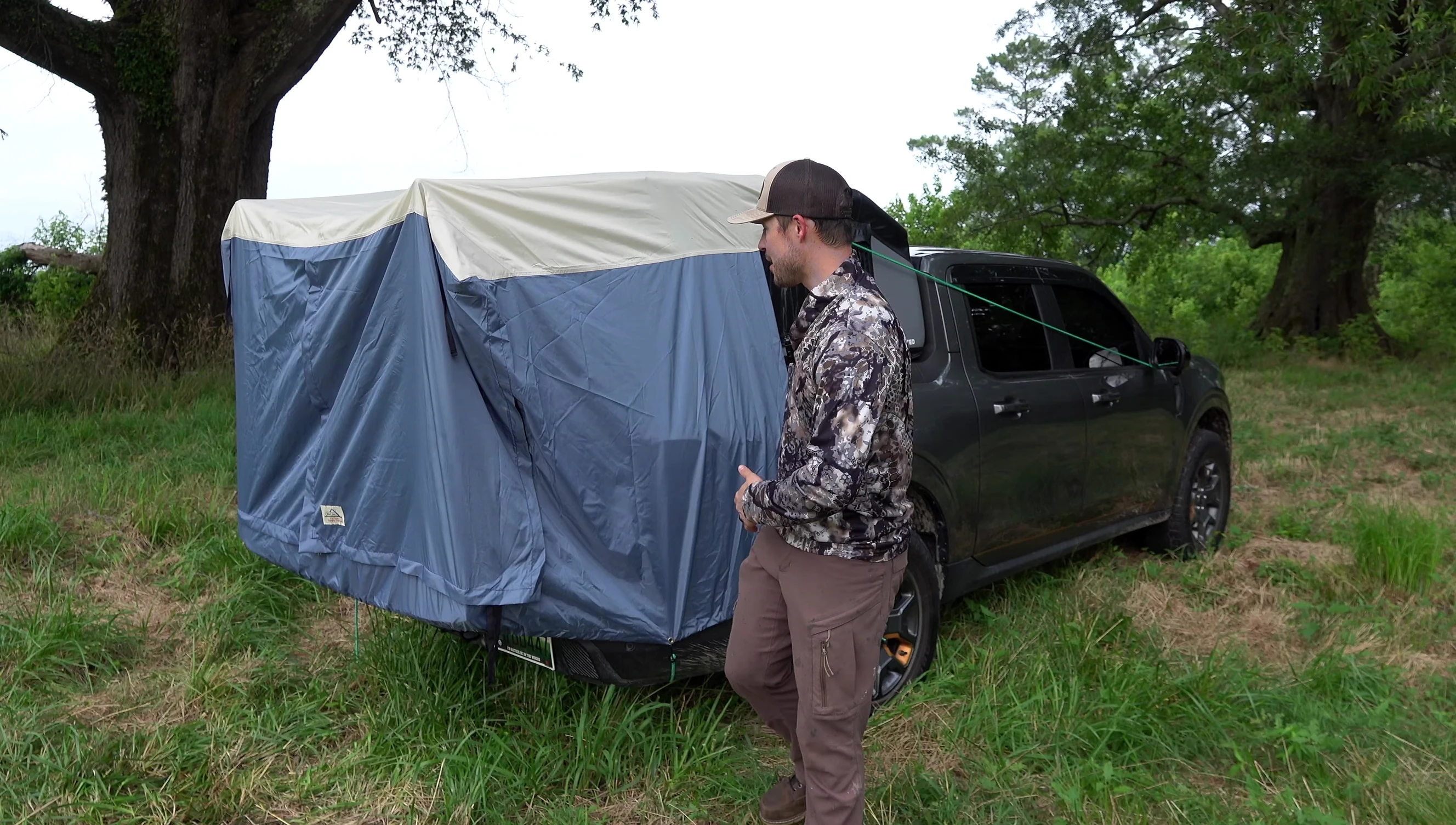 The user inside the DAC tent, highlighting the available space within the tent.
