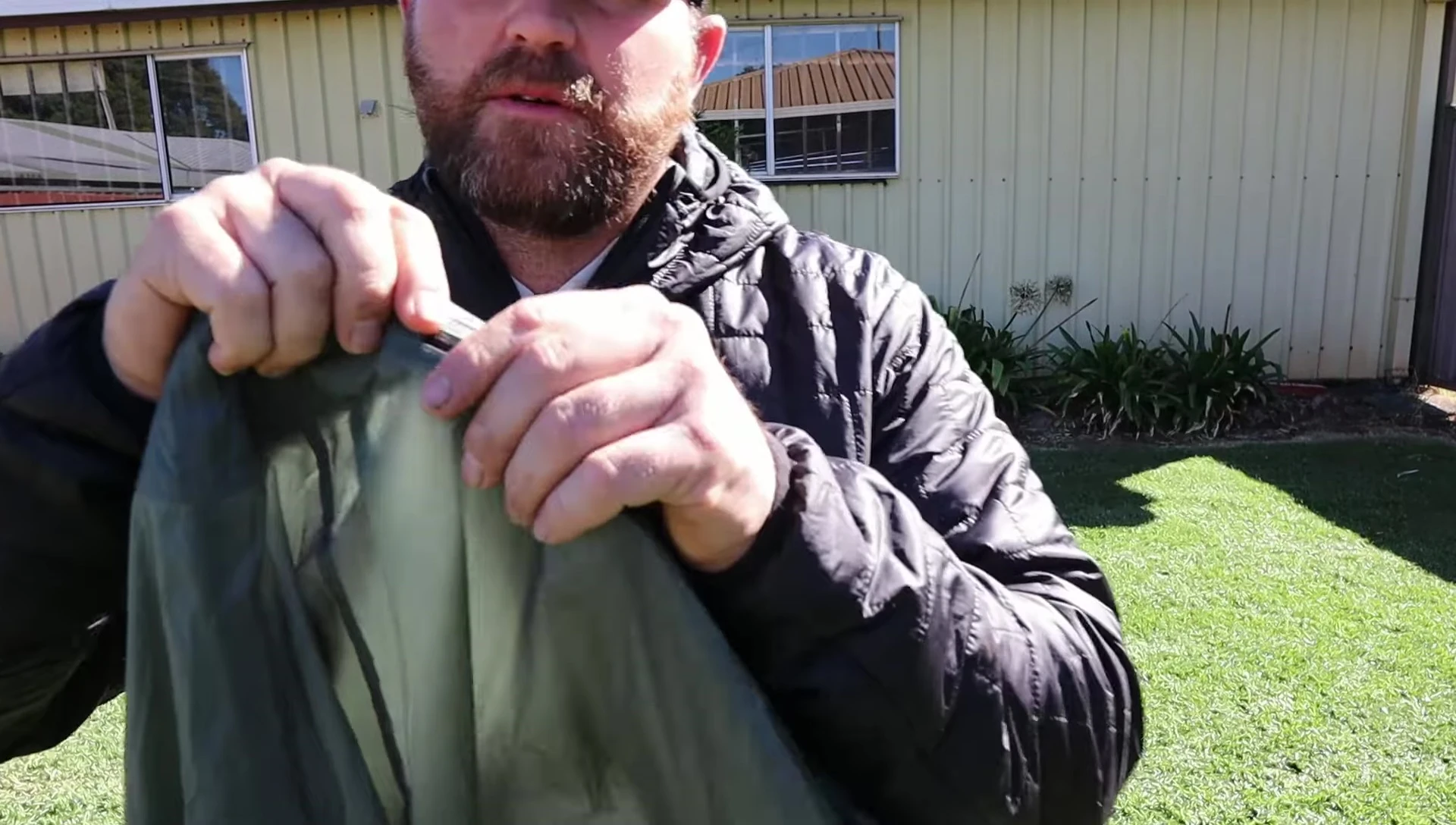 Close up shot showing YKK zippers and a vestibule clip