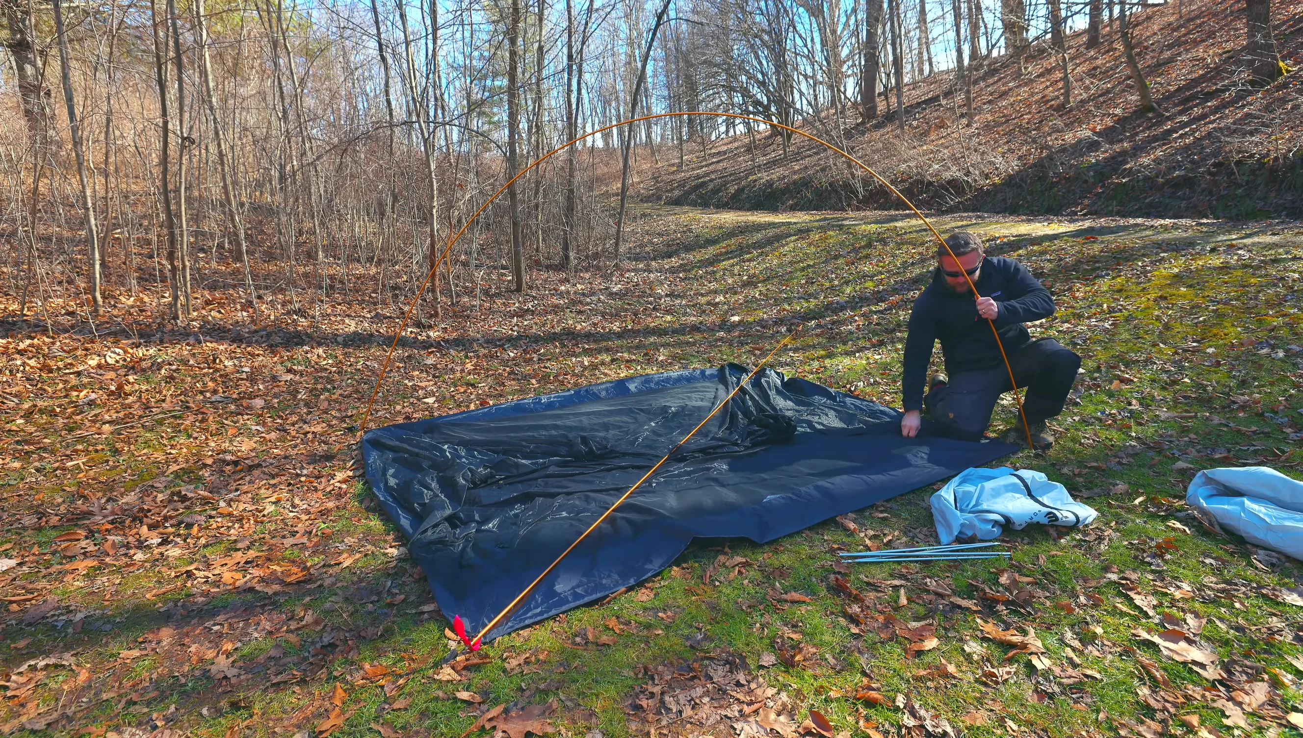 Color-coded tent parts during setup.
