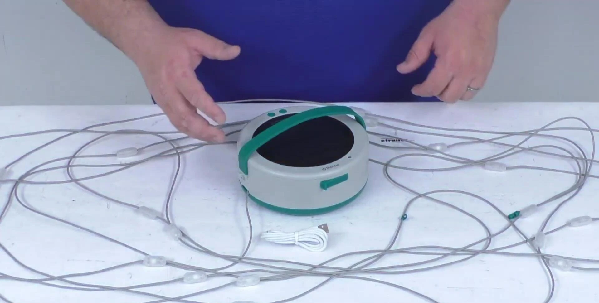 The presenter begins demonstrating the storage process.