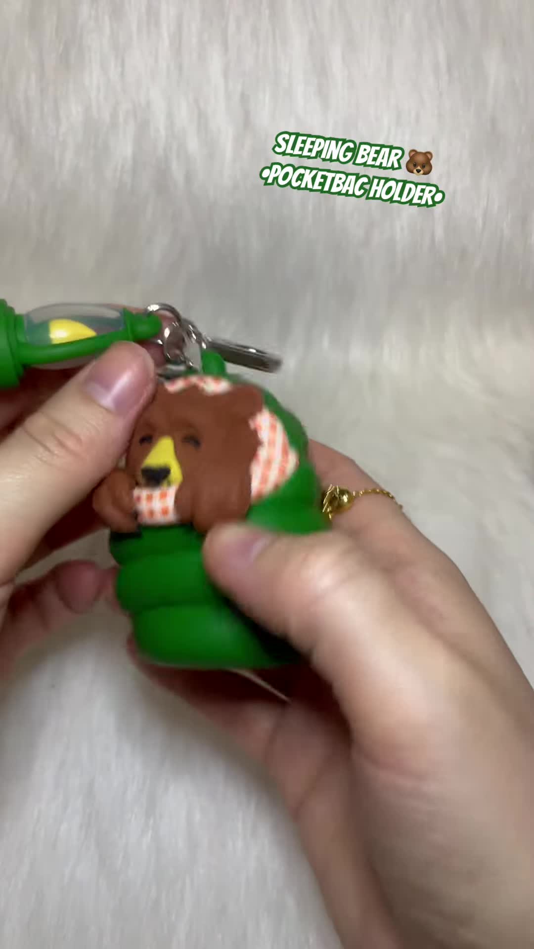 Showing the silicone material and silver hardware.